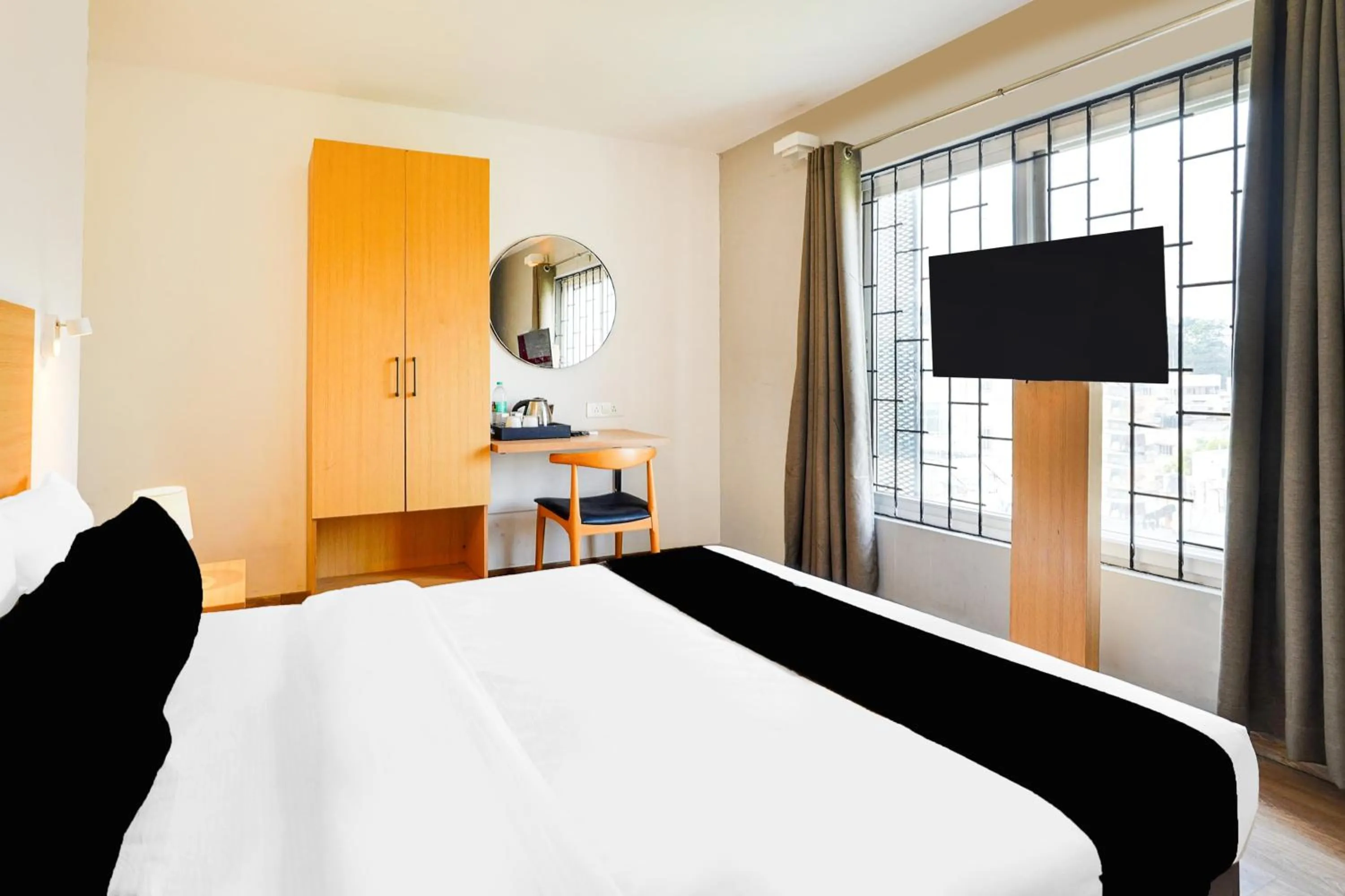 Standard Double Room - single occupancy in Super Townhouse BTM Layout Near Madiwala Lake Formerly Q Rooms