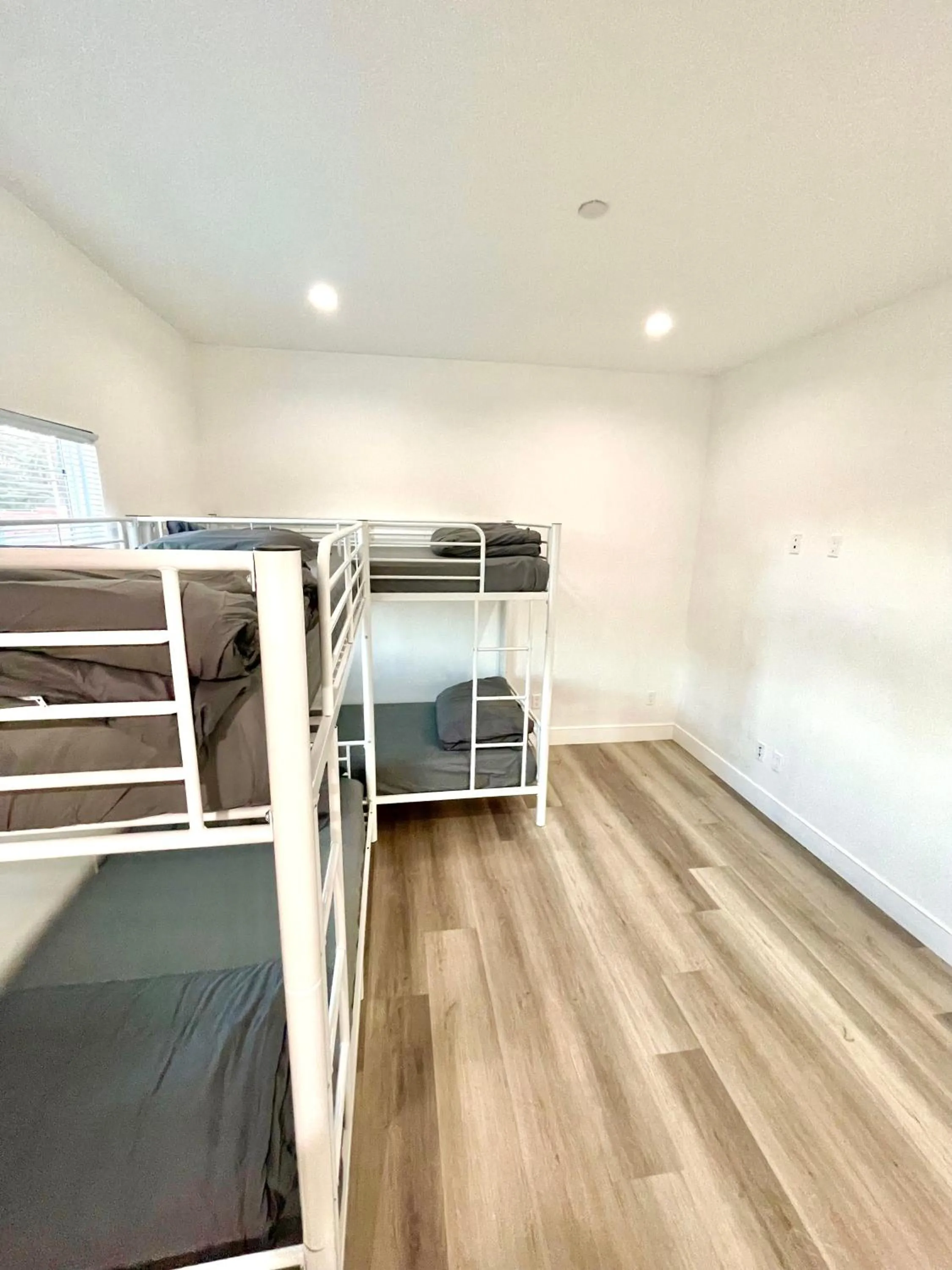 Bed in 4-Bed Dormitory Room in Modern Hostel