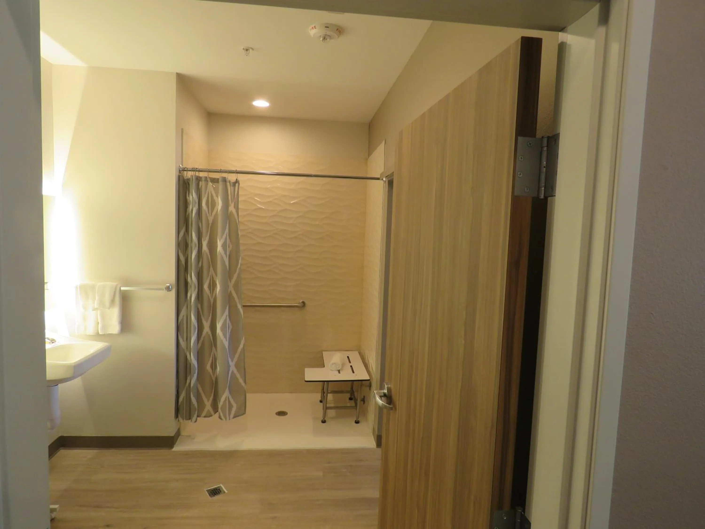 1 King Bed, Mobility Accessible Room, 1BR Suite, Roll in shower, Non-Smoking in Wyndham Garden College Station