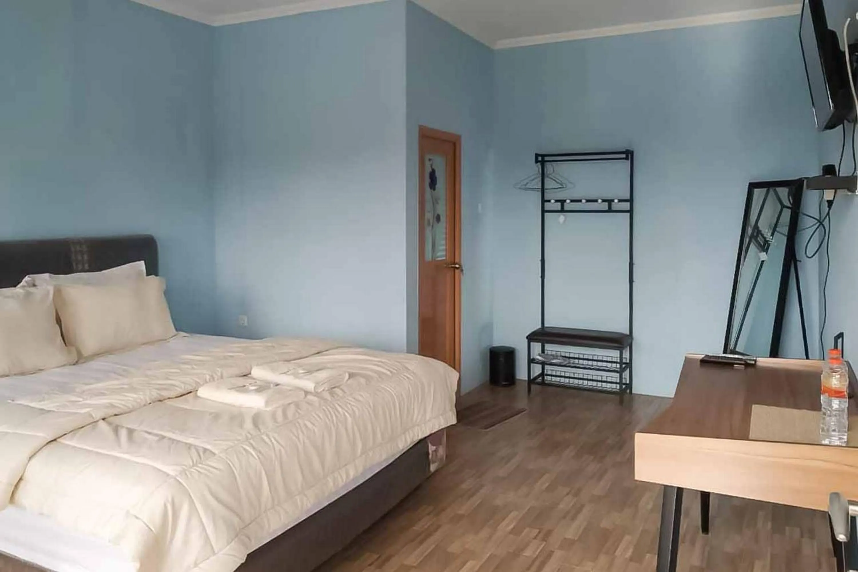 Standard Double Room in Kampung Abdi Resort Syariah Mitra RedDoorz