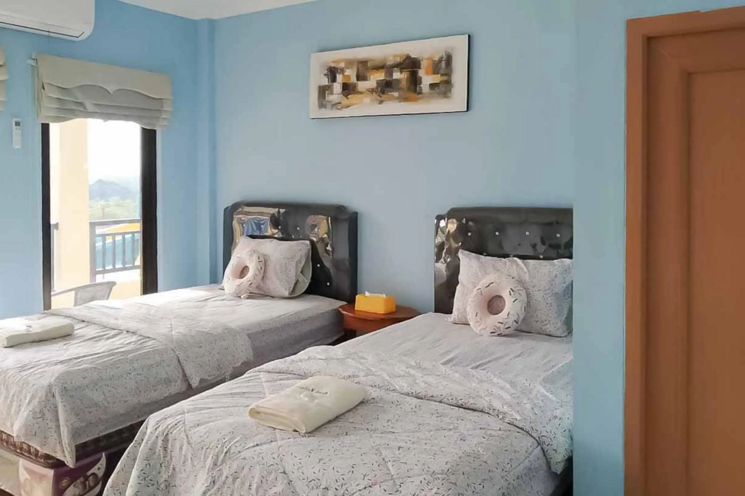 Twin Room in Kampung Abdi Resort Syariah Mitra RedDoorz