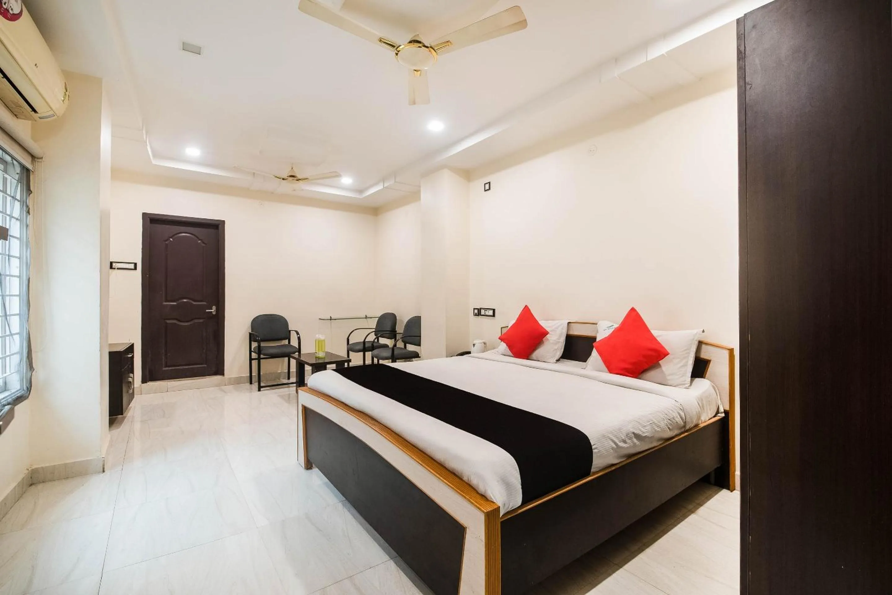 Deluxe Triple Room - single occupancy in Capital O Aditya Grand