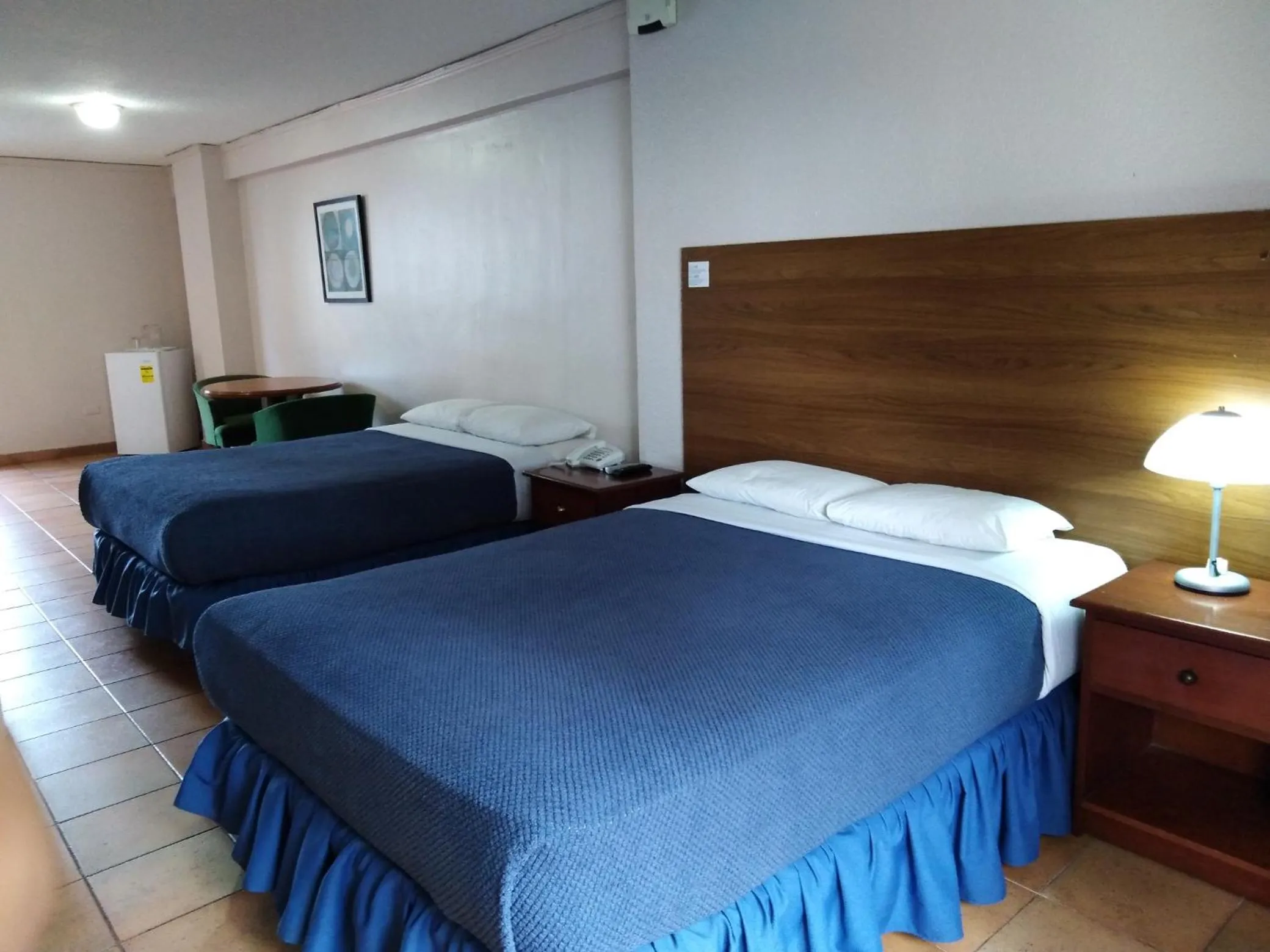 Quadruple Room in Hotel Tower House Suites