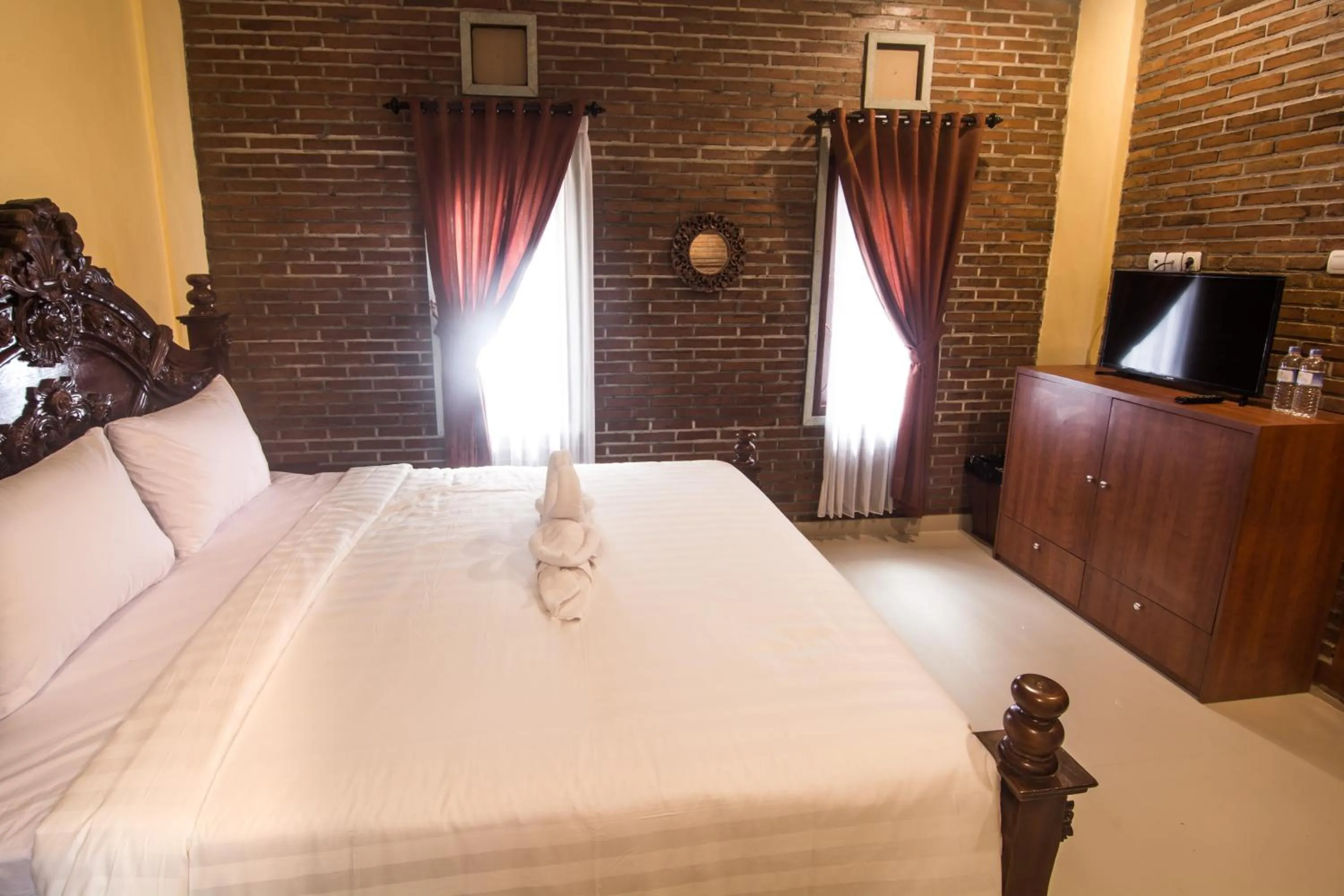 Double Room with Pool View in The Garuda Homestay Sanur