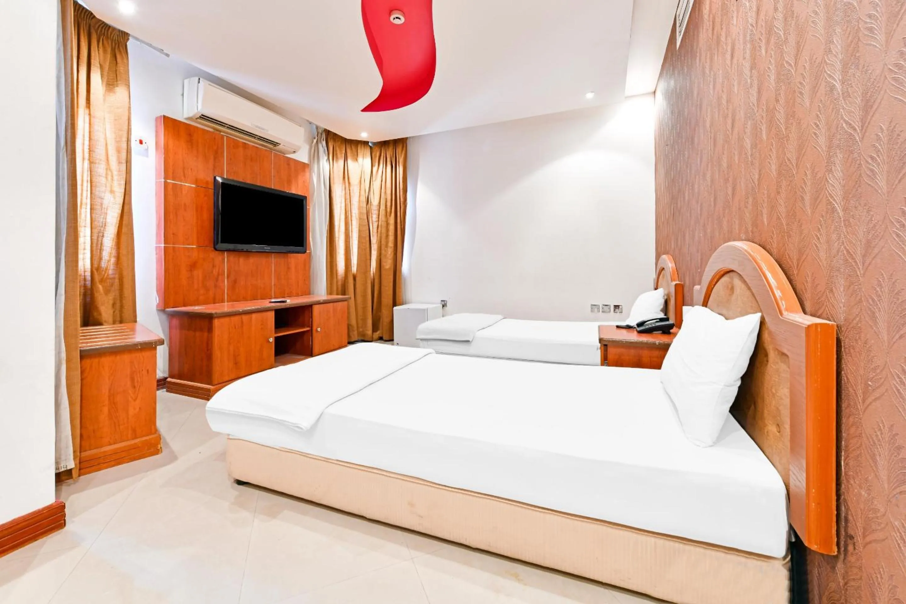 Deluxe Twin Room in OYO 118 Revira Hotel