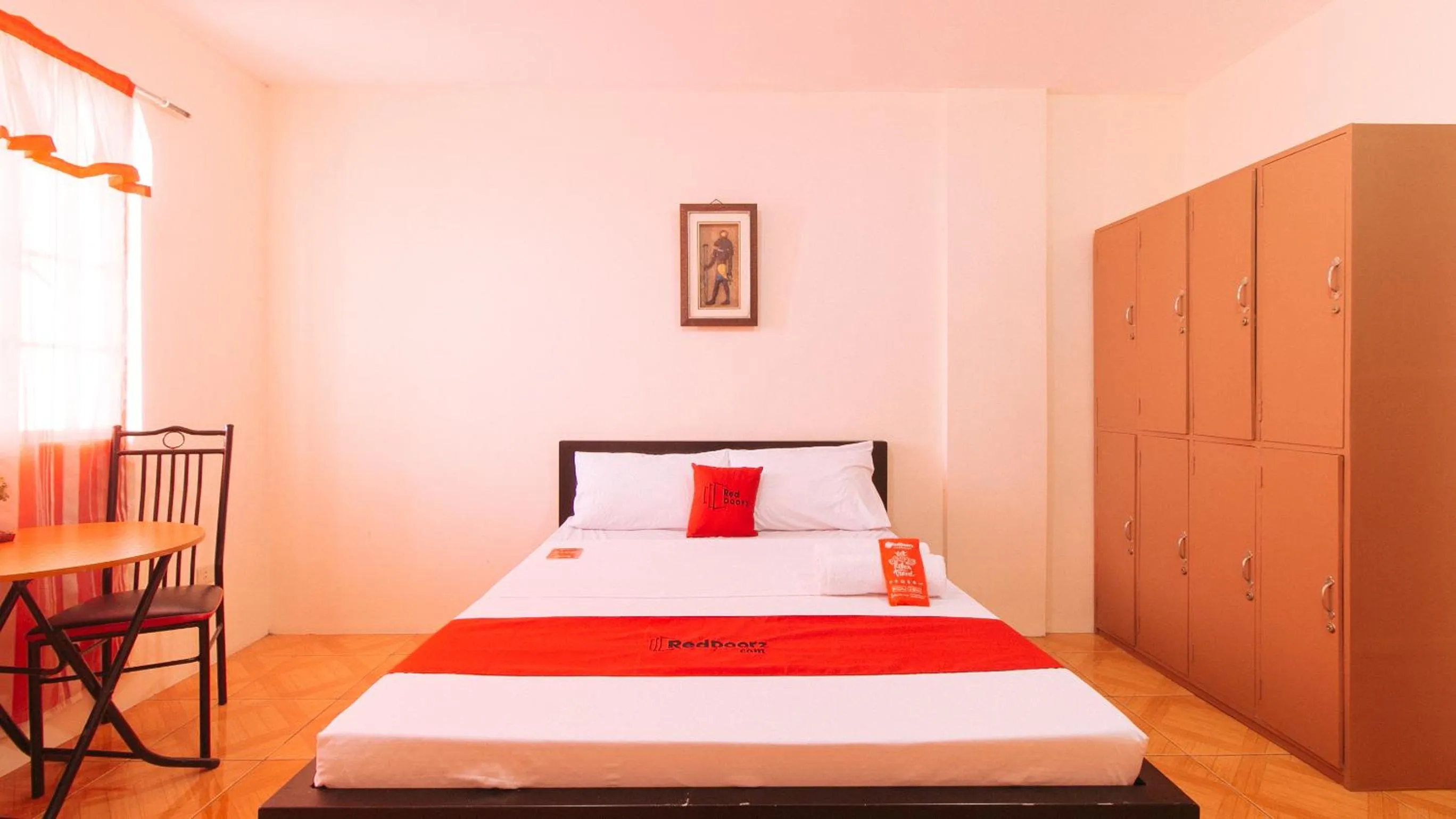 Deluxe Room in RedDoorz @ FDB Homes Nueva Ecija