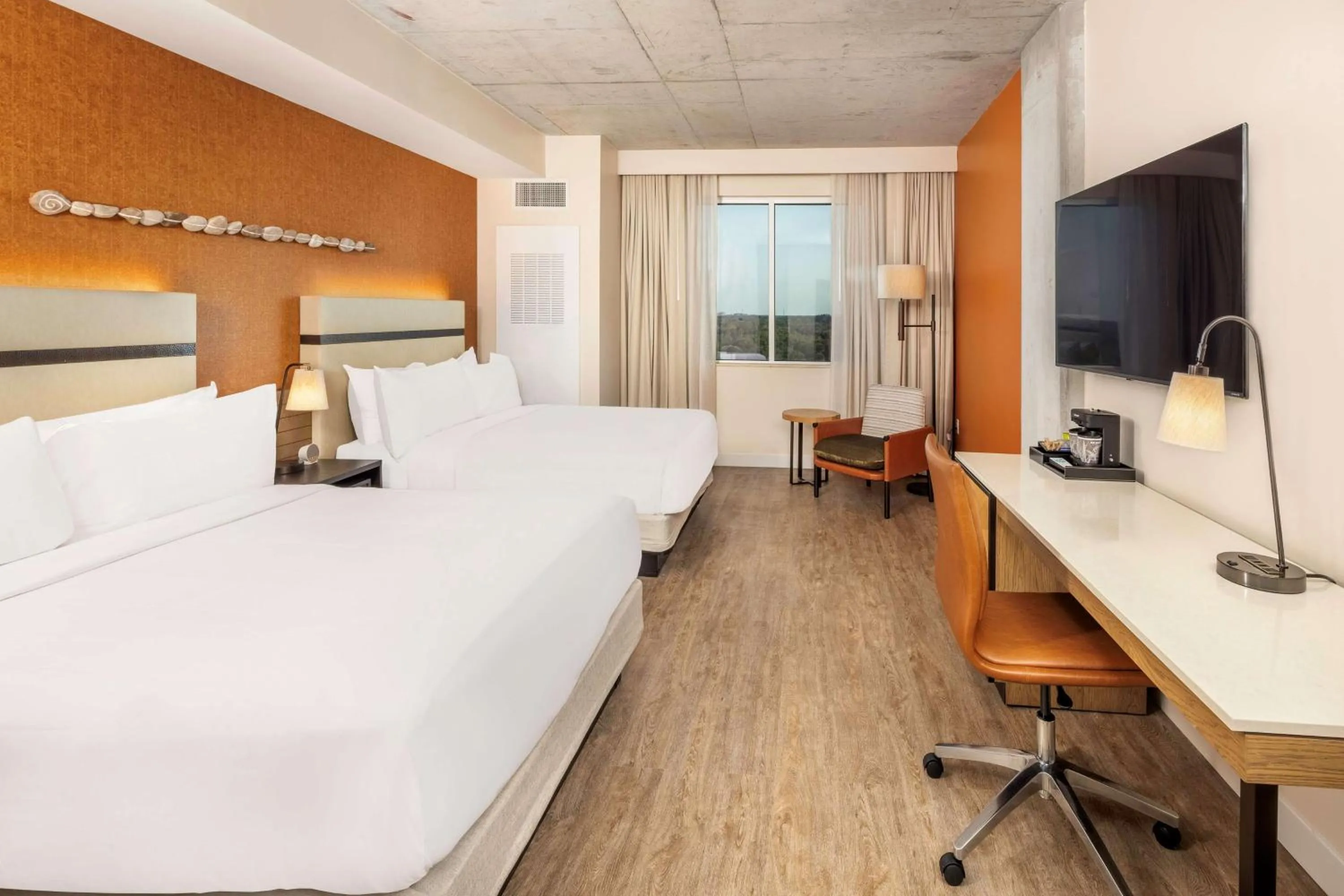 Queen Room with Two Queen Beds and City View in Hotel Melby Downtown Melbourne Tapestry Collection By Hilton