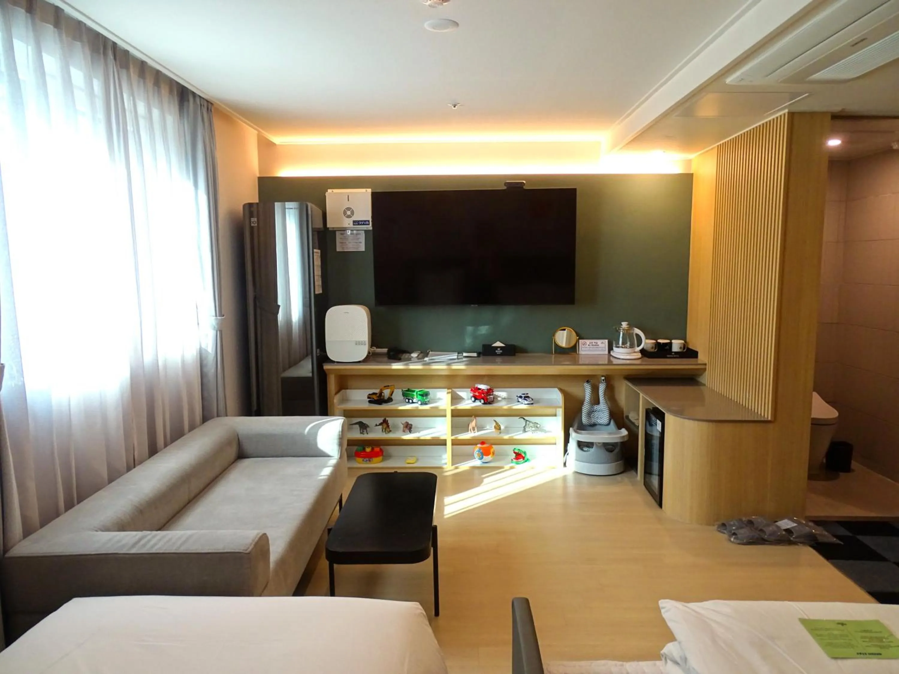 Baby Room (Fully equipped with formula warmer, bottle sterilizer, gumbo chair, low bed with bed guard, baby bathtub, toys, baby toilet seat cover, sink step stool)  in Hound Hotel Busan Station