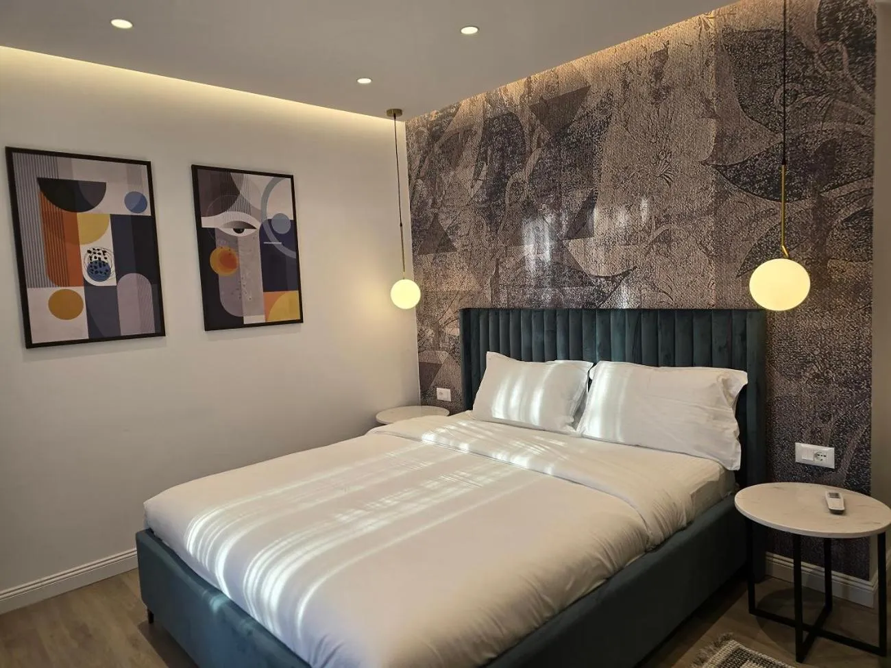 Superior Quadruple Room in Perla Hotel