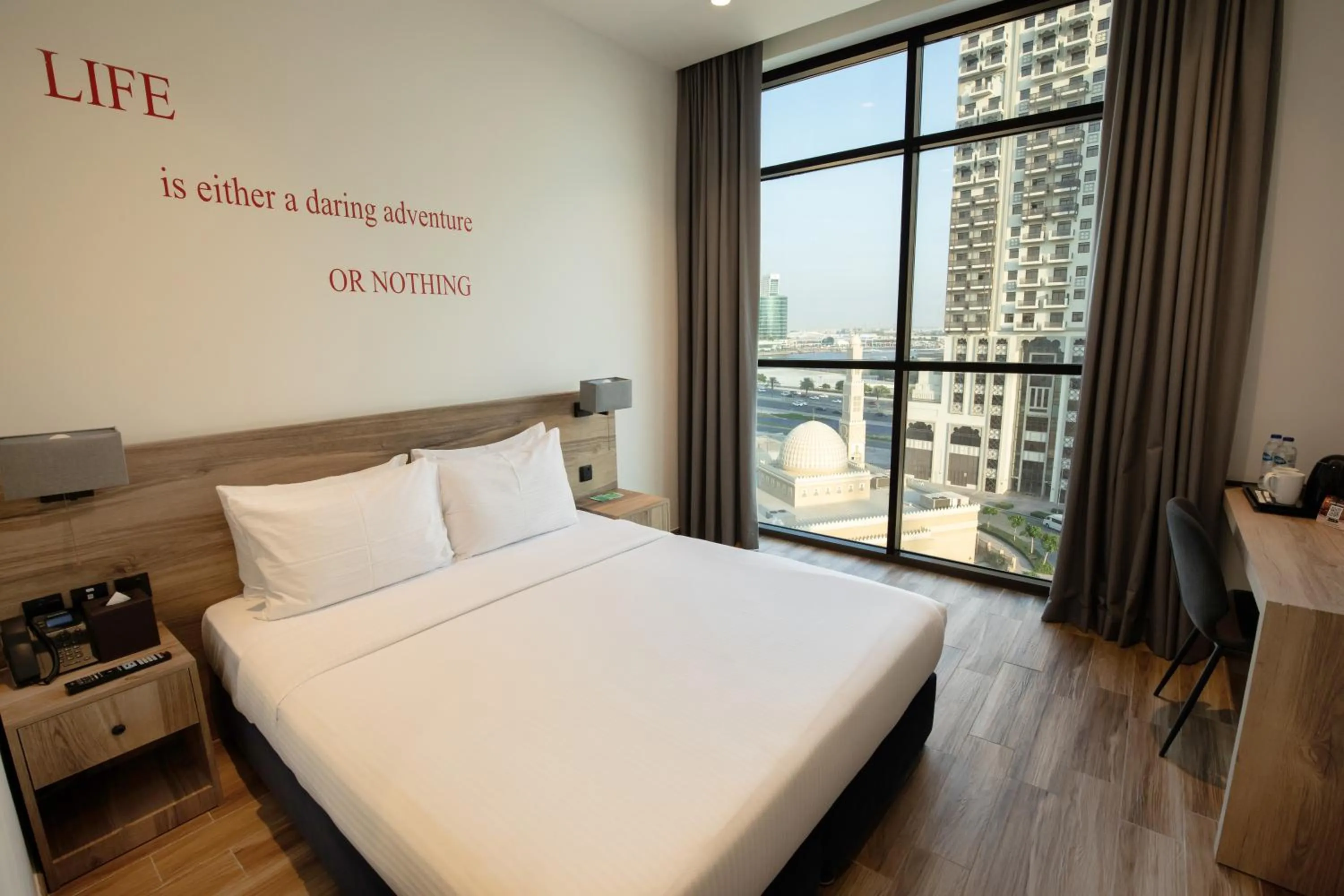 Deluxe Room King Bed with City View (includes 25% off F&B) in Kingsgate Al Jaddaf Hotel by Millennium