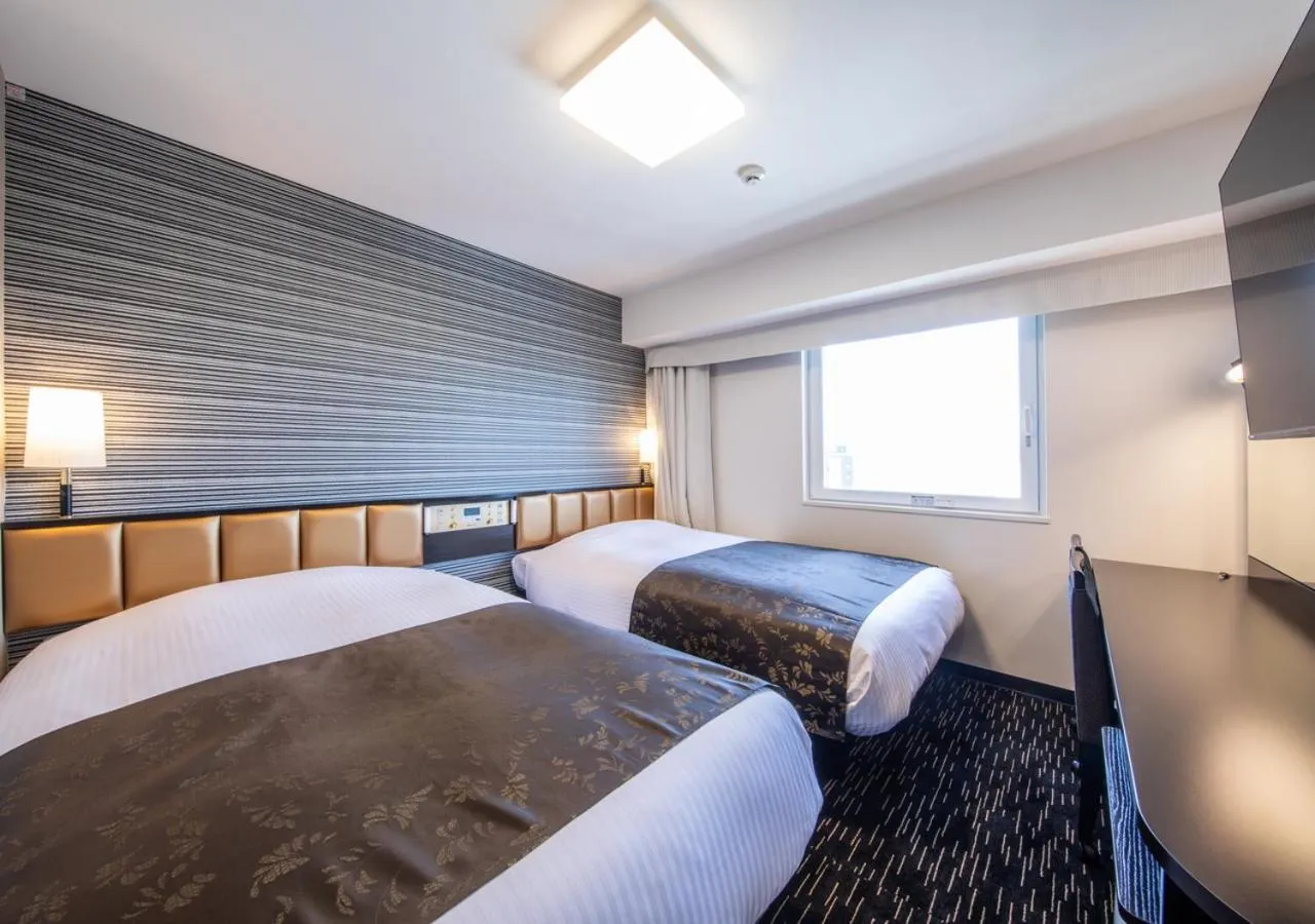 Standard Twin Room with Public Bath Access (Central Tower) - single occupancy - Non-Smoking in APA Hotel Hakataeki Chikushiguchi