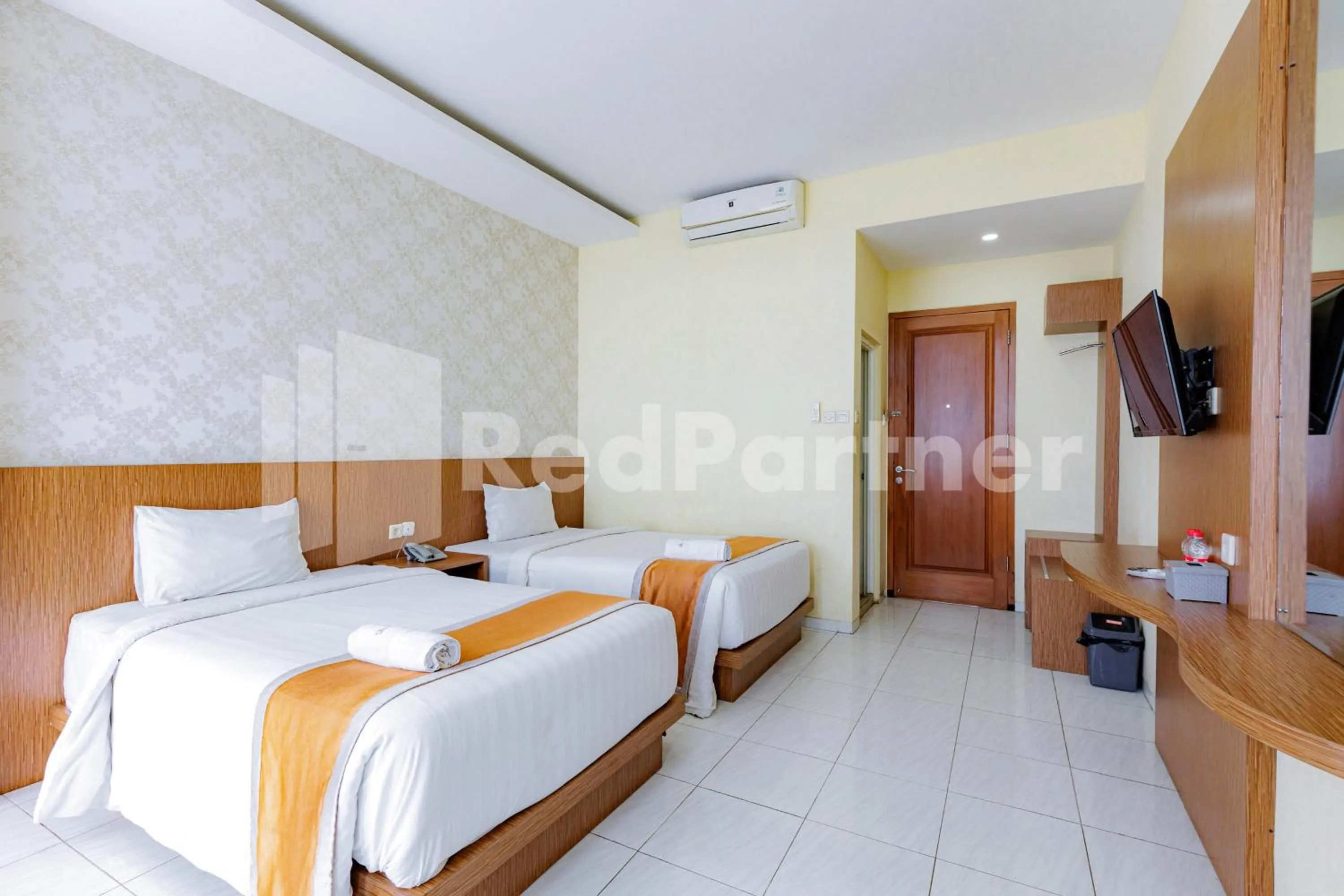 Superior Twin Room in De Malang Sweet Homestay Syariah Mitra RedDoorz