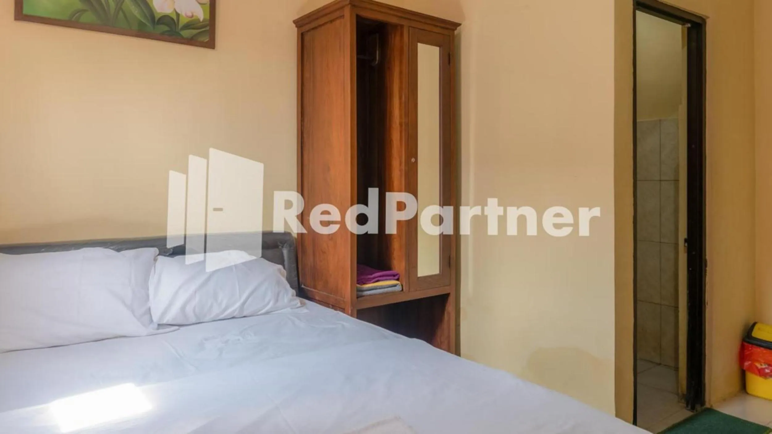 Standard Double Room - single occupancy in Vandhela Homestay Syariah Mitra RedDoorz