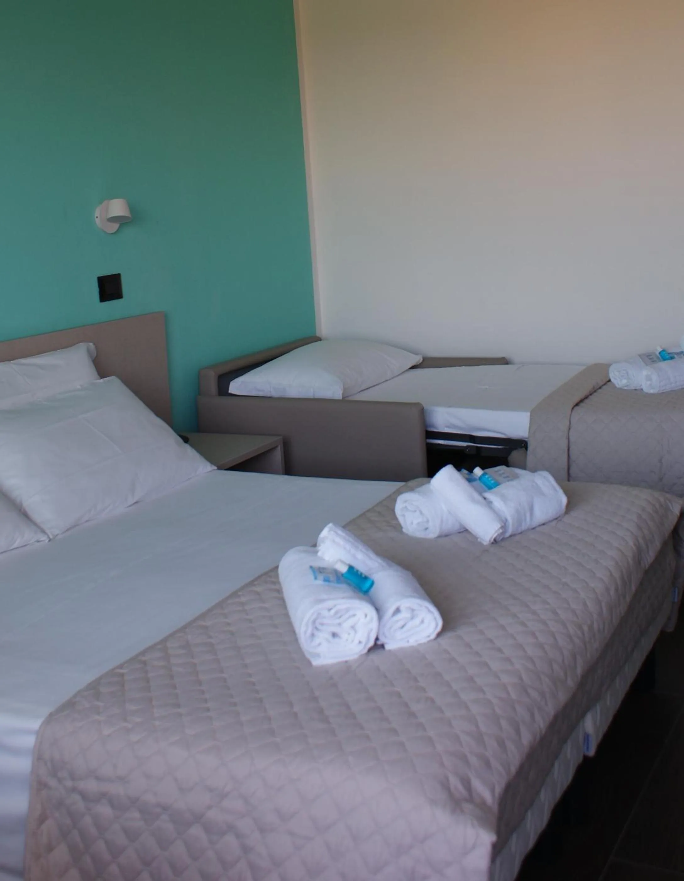 Triple Room with Side Sea View in Hotel Palazzo Caveja