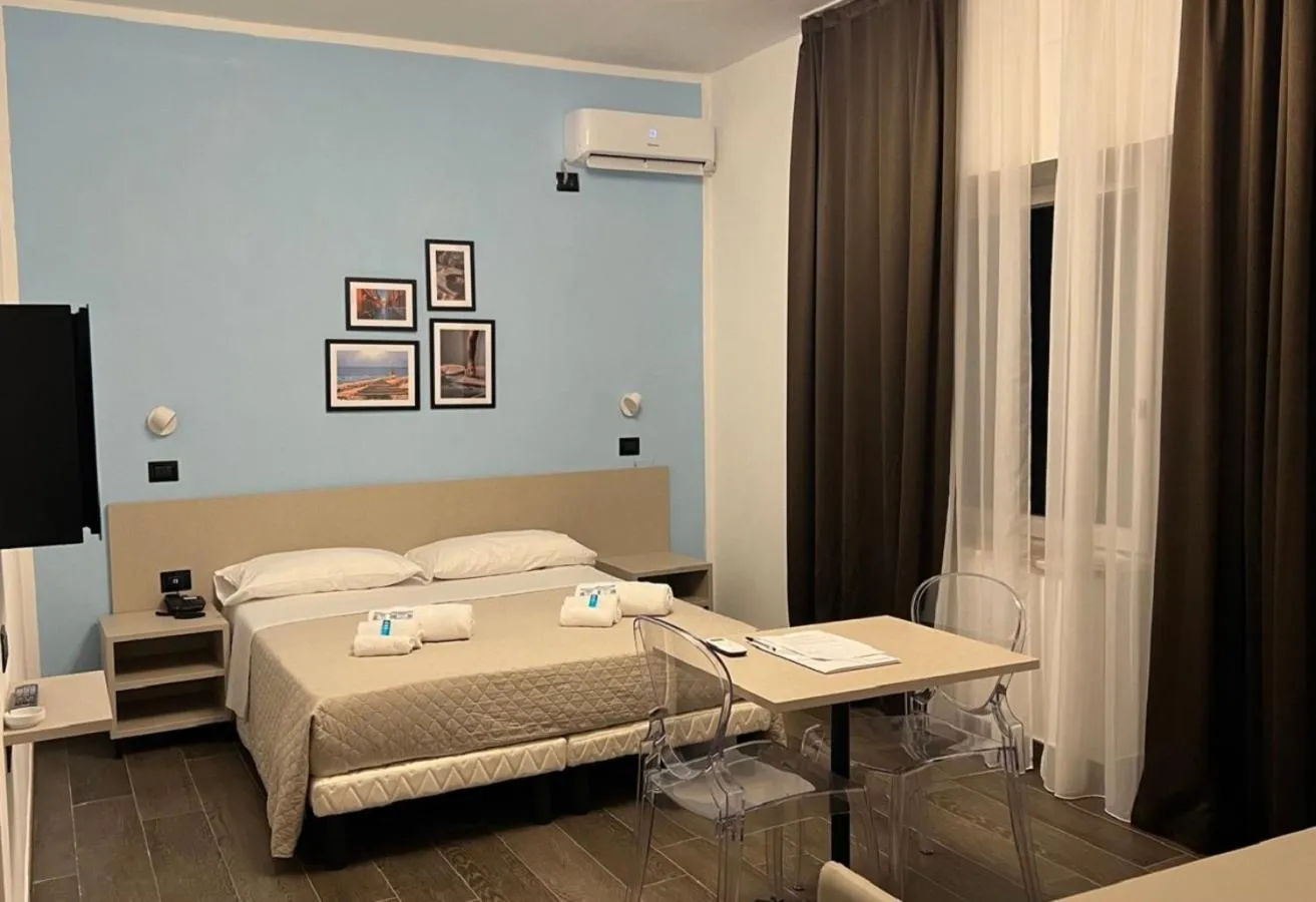 Quadruple Room with Sea View in Hotel Palazzo Caveja