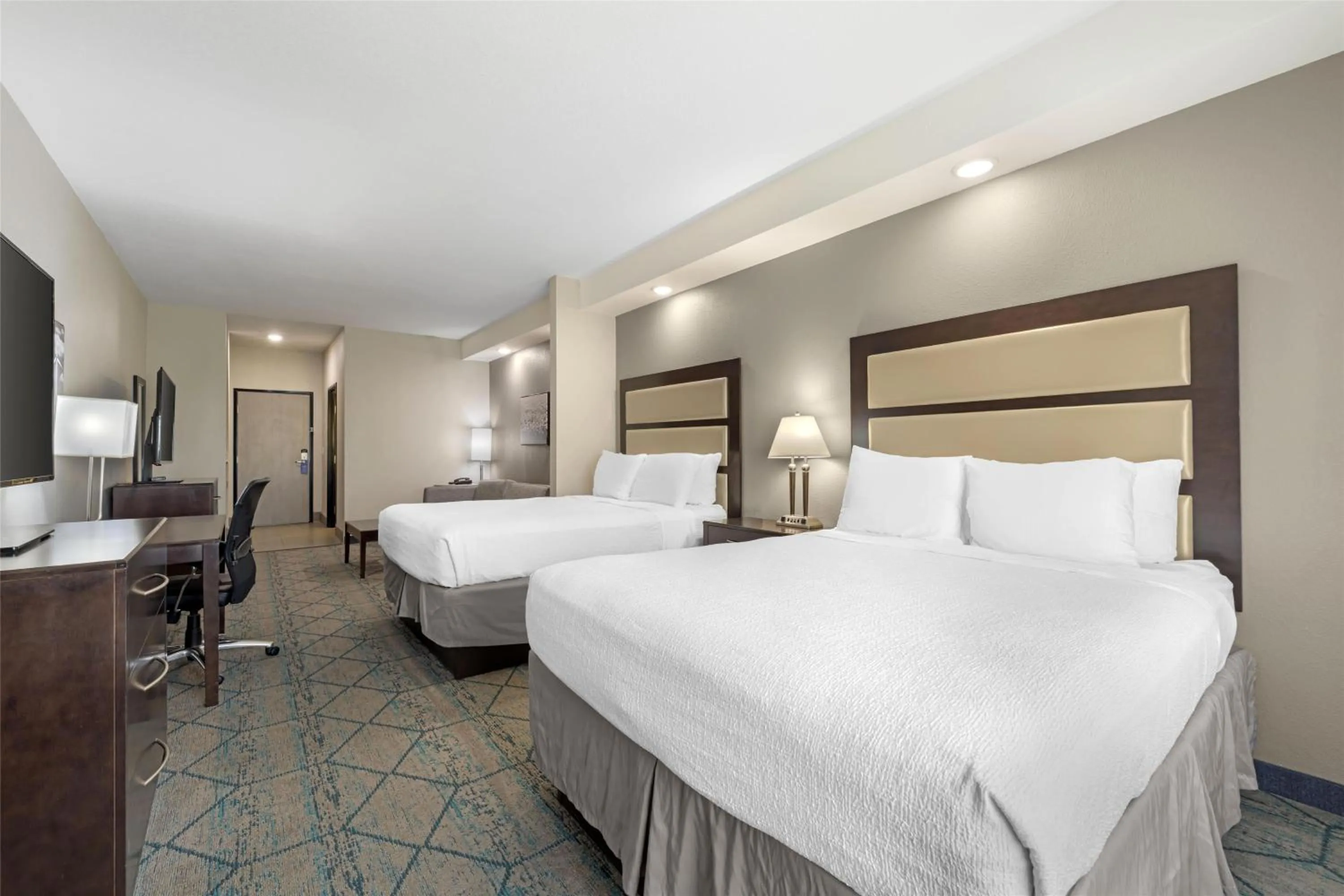 Queen Suite with Two Queen Beds and Sofa Bed in Best Western Plus McPherson