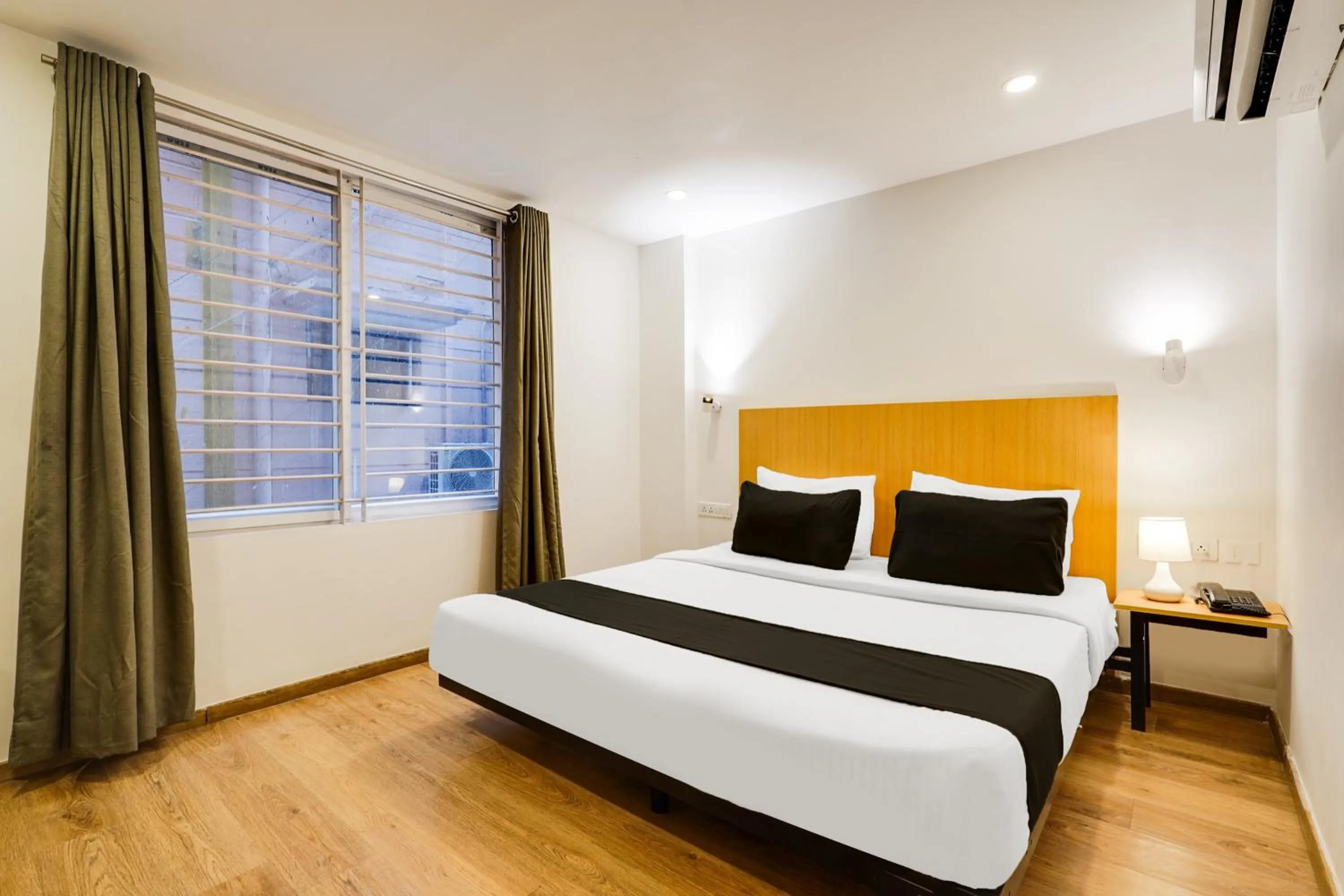 Classic Triple Room - single occupancy in Super Townhouse Oak Indiranagar