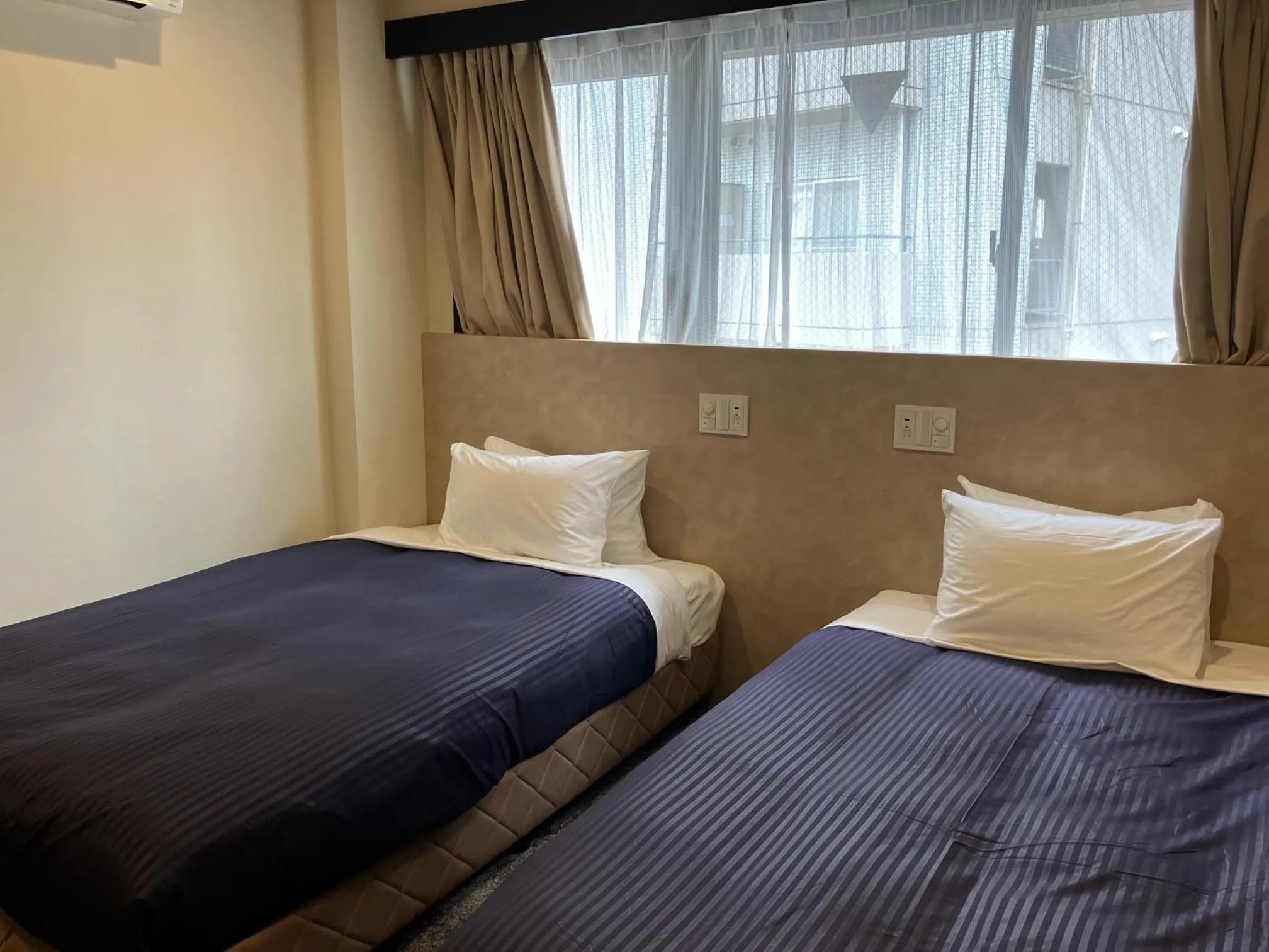 Standard Twin Room - single occupancy in Hotel Livemax BUDGET Umeda
