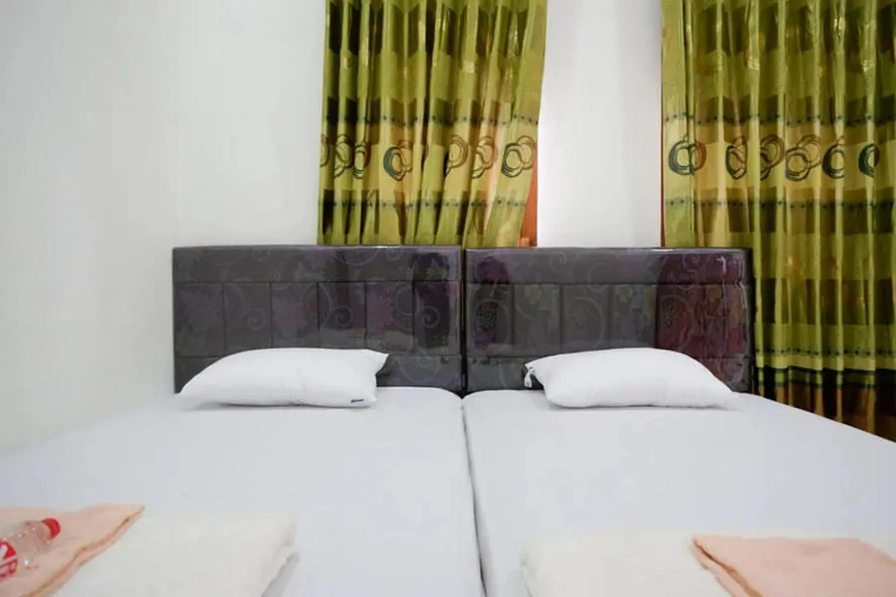Superior Twin Room in Griya Mataram Kotagede Mitra RedDoorz