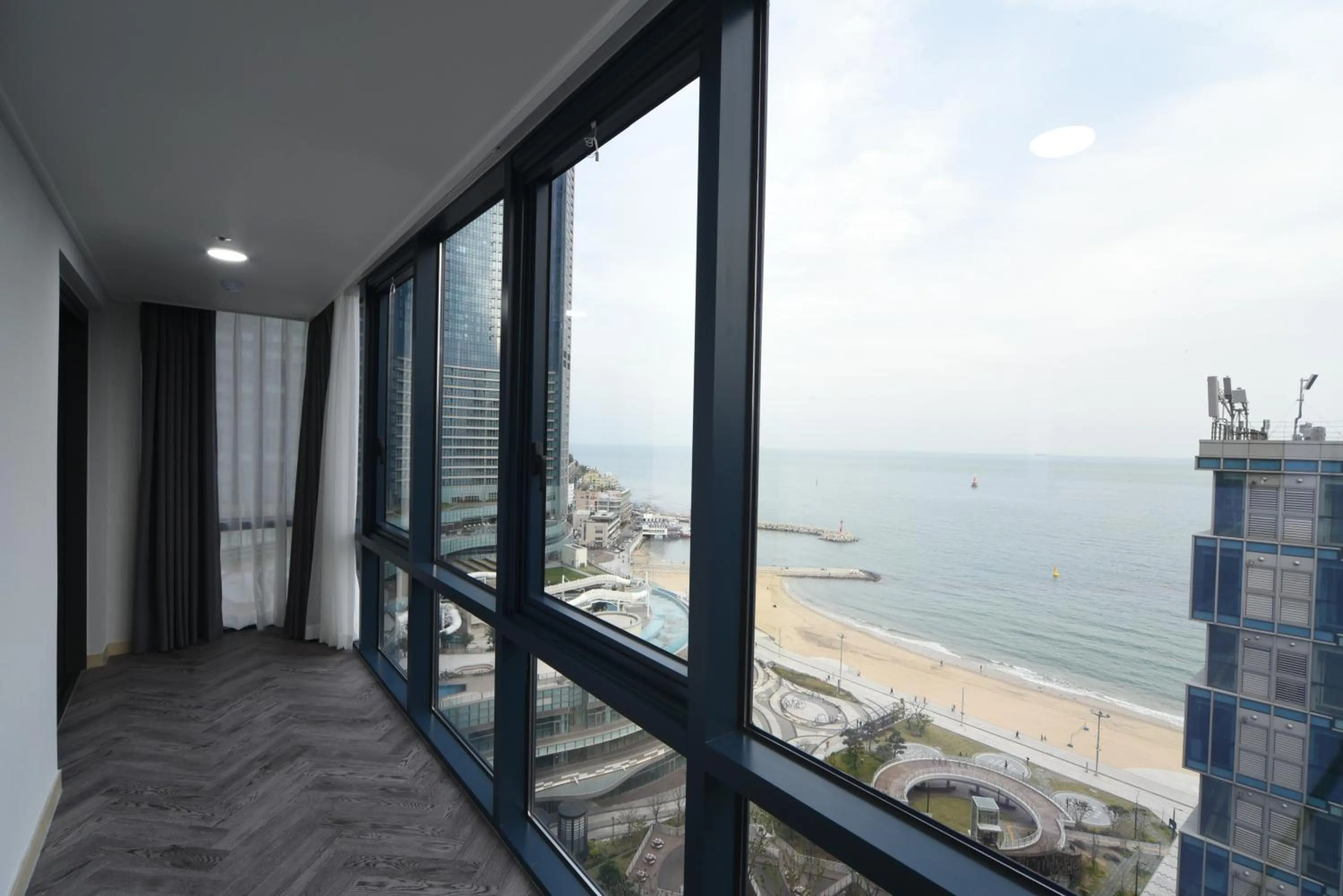 Deluxe Double Room Ocean View with Rooftop Swimming Pool Access For 2 in Haeundae Central Hotel