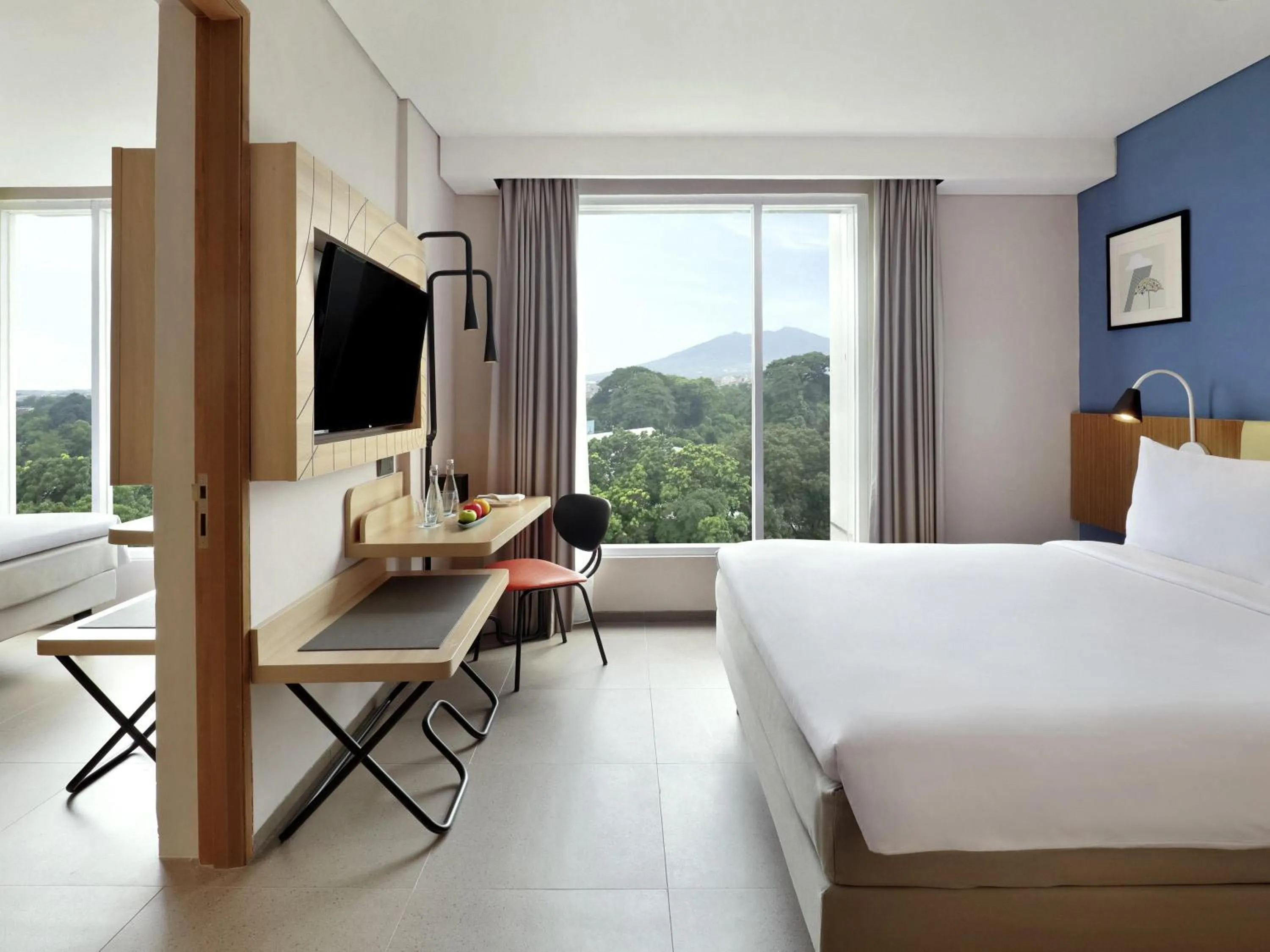 Family Room with 1 Double Bed & 2 Single Beds in ibis Styles Bogor Pajajaran