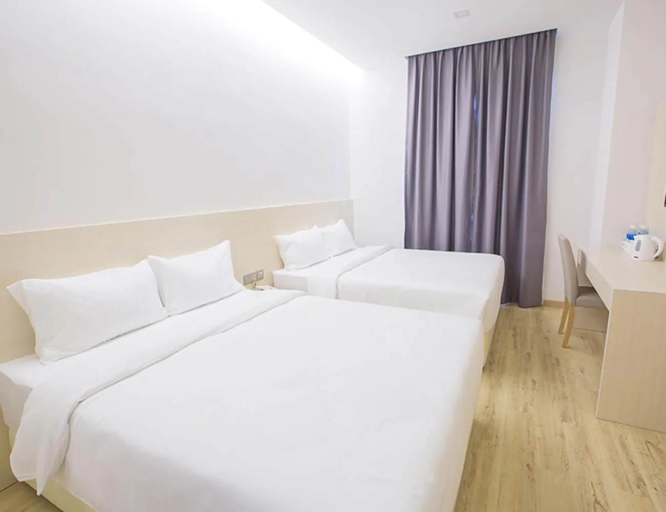 Quadruple Room in Minimalist Hotel