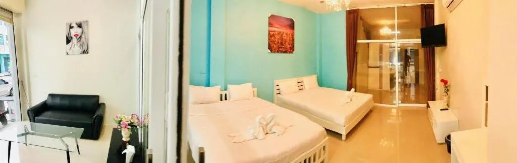 Premium Quadruple Room in Supachai Inn