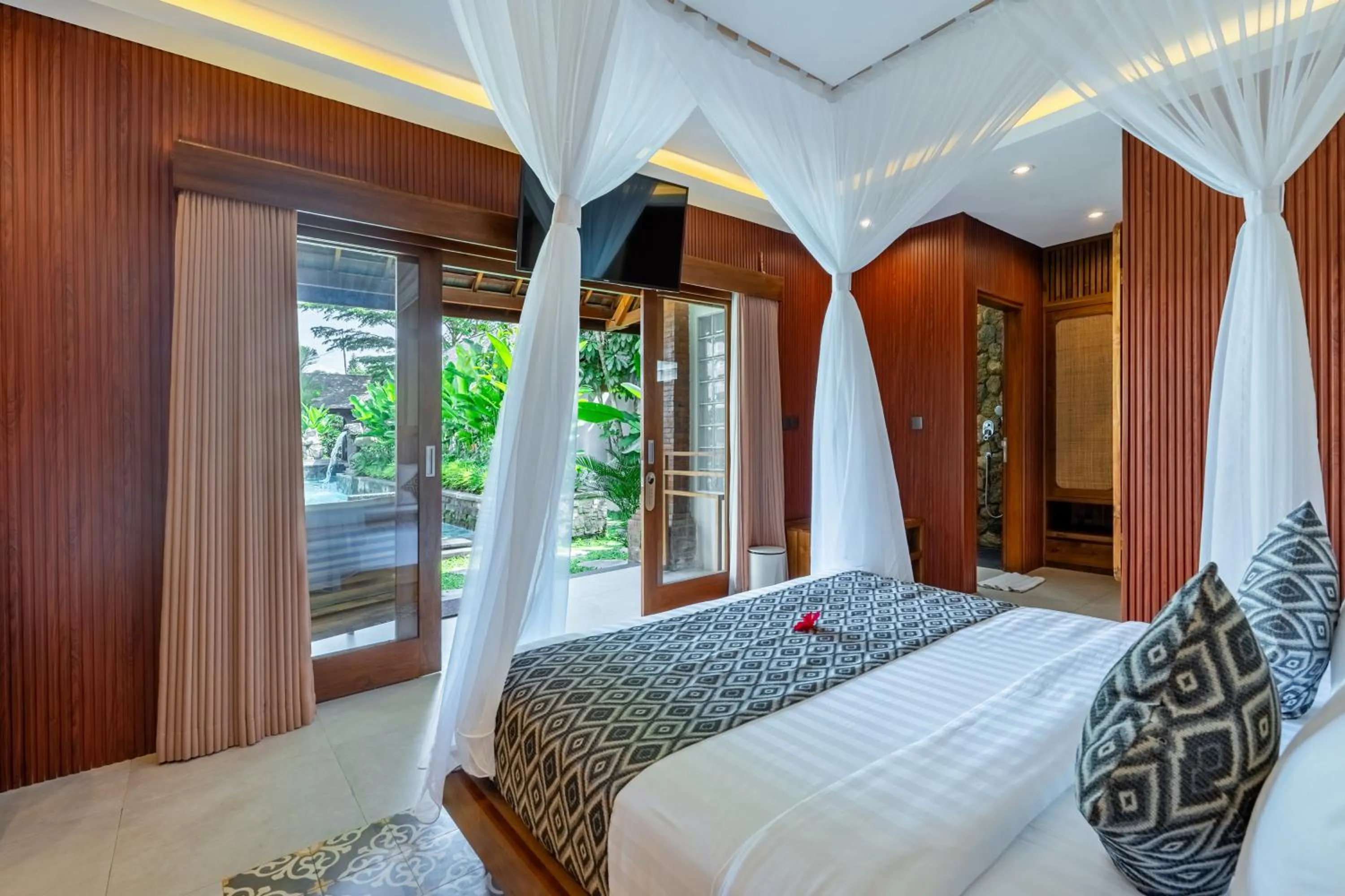 Deluxe Room with Pool View in Puri Andong Villa