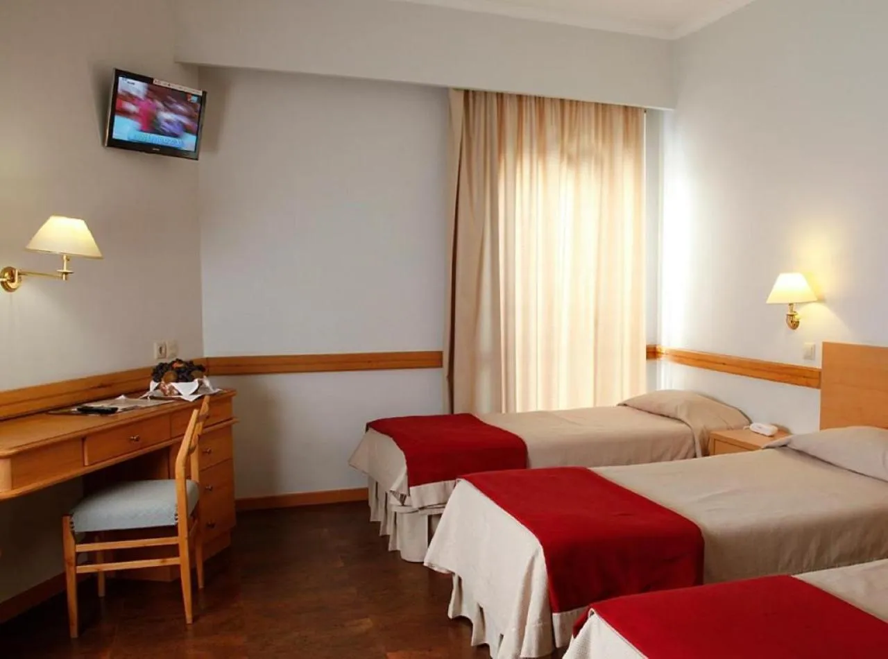 Triple Room in Consolata Hotel
