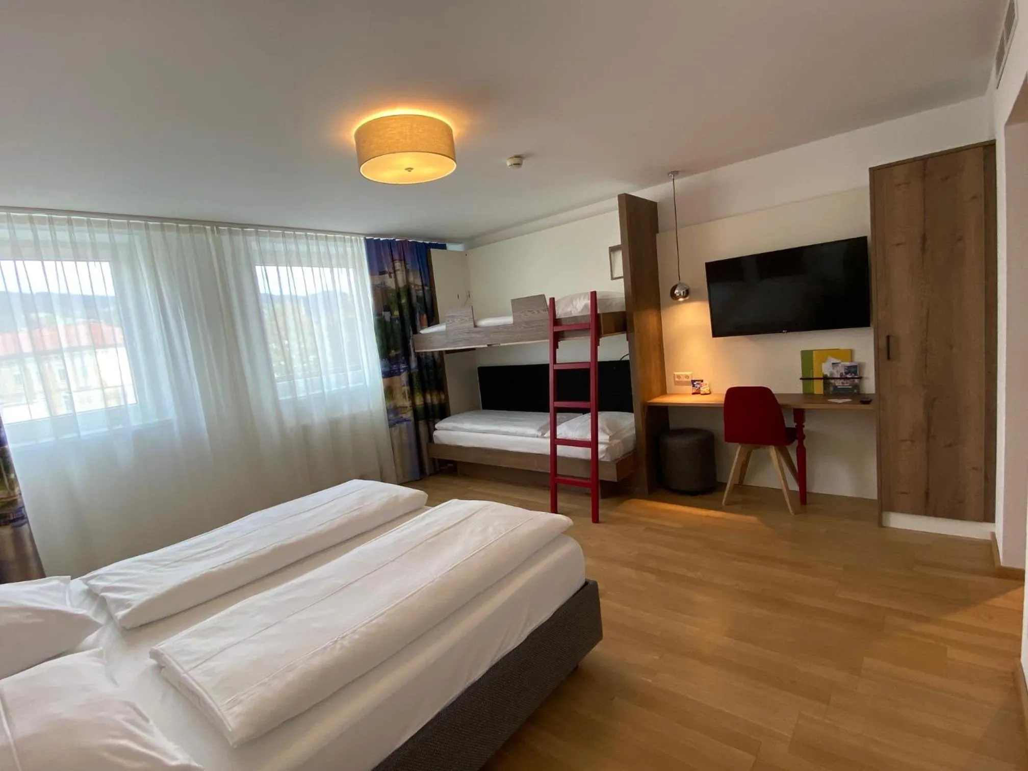 Quadruple Room in JUFA Hotel Salzburg