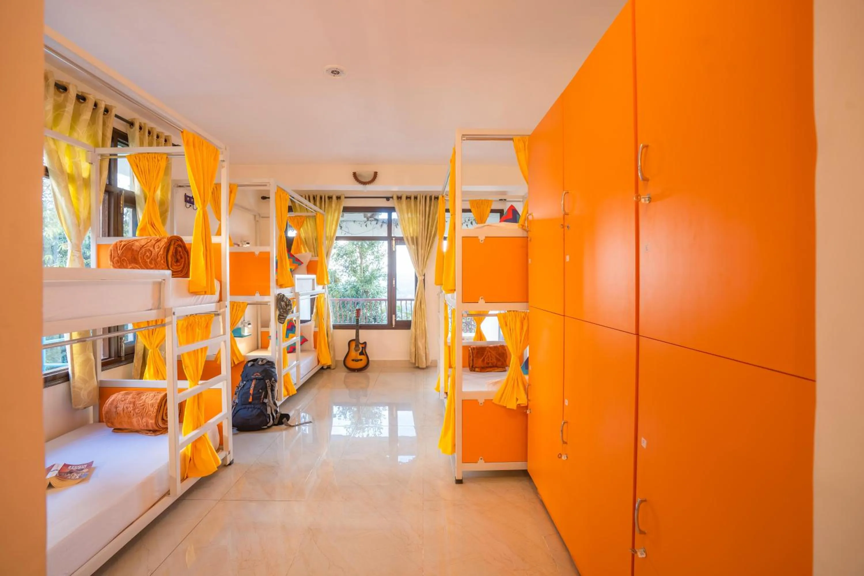 Bed in 6 Bed Mixed Dormitory Room with Ensuite Bathroom in goSTOPS Mukteshwar