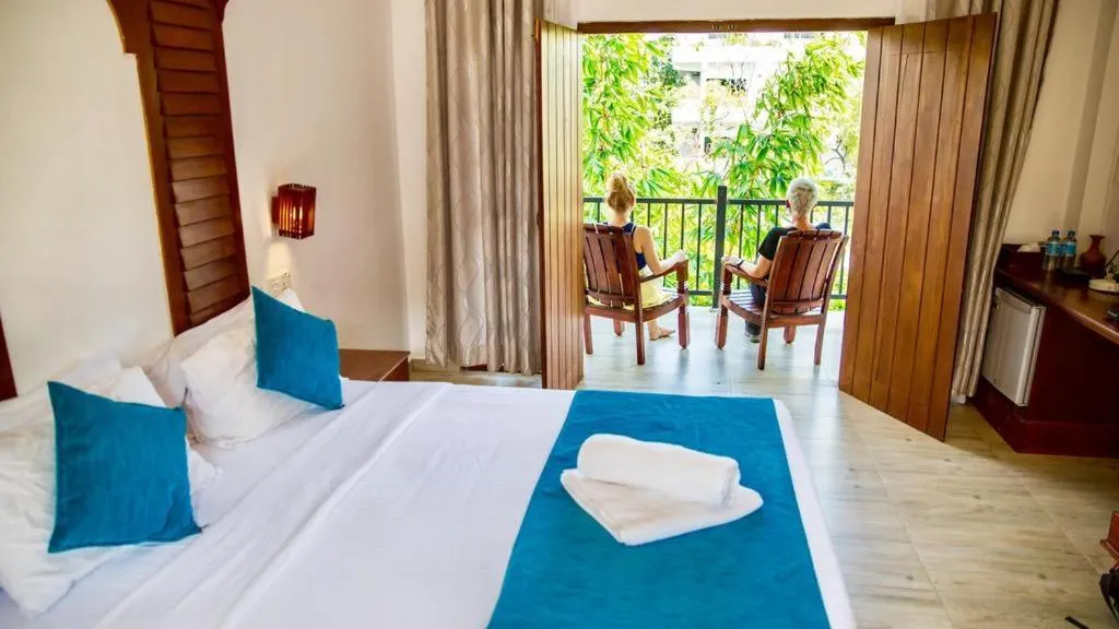 King Room with Balcony and Pool View in Sundaras Resort & Spa Dambulla