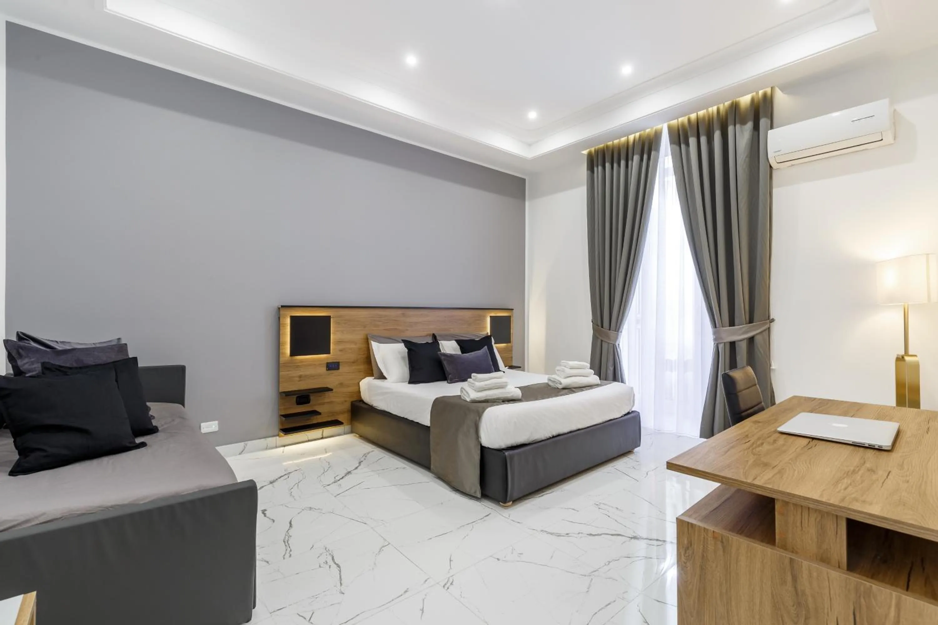 Superior Quadruple Room - single occupancy in Sant'Angelo Suites