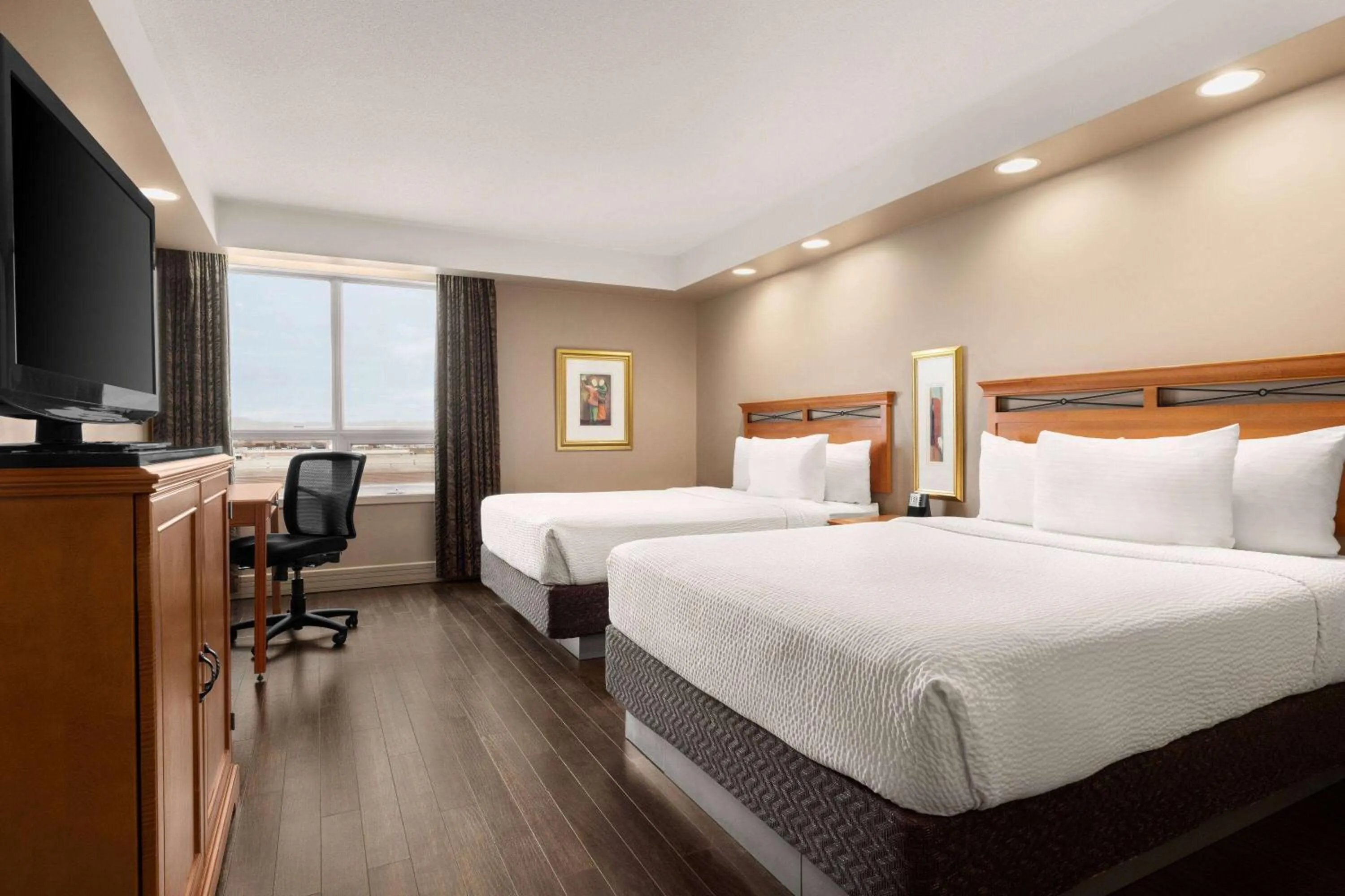 Queen Room with Two Queen Beds - Non-Smoking in Royal Hotel Calgary, Trademark Collection by Wyndham