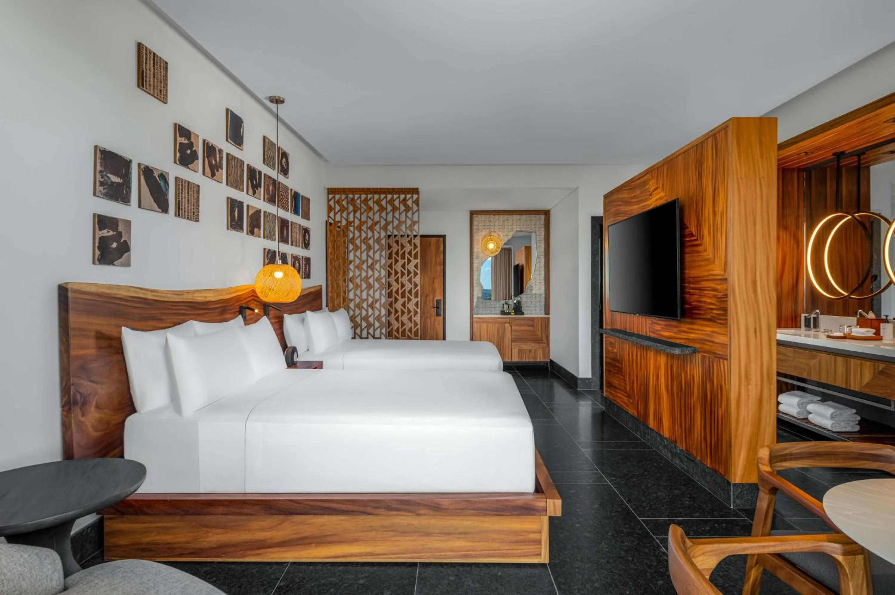 Queen Room with Two Queen Beds and Tropical View in Conrad Tulum Riviera Maya