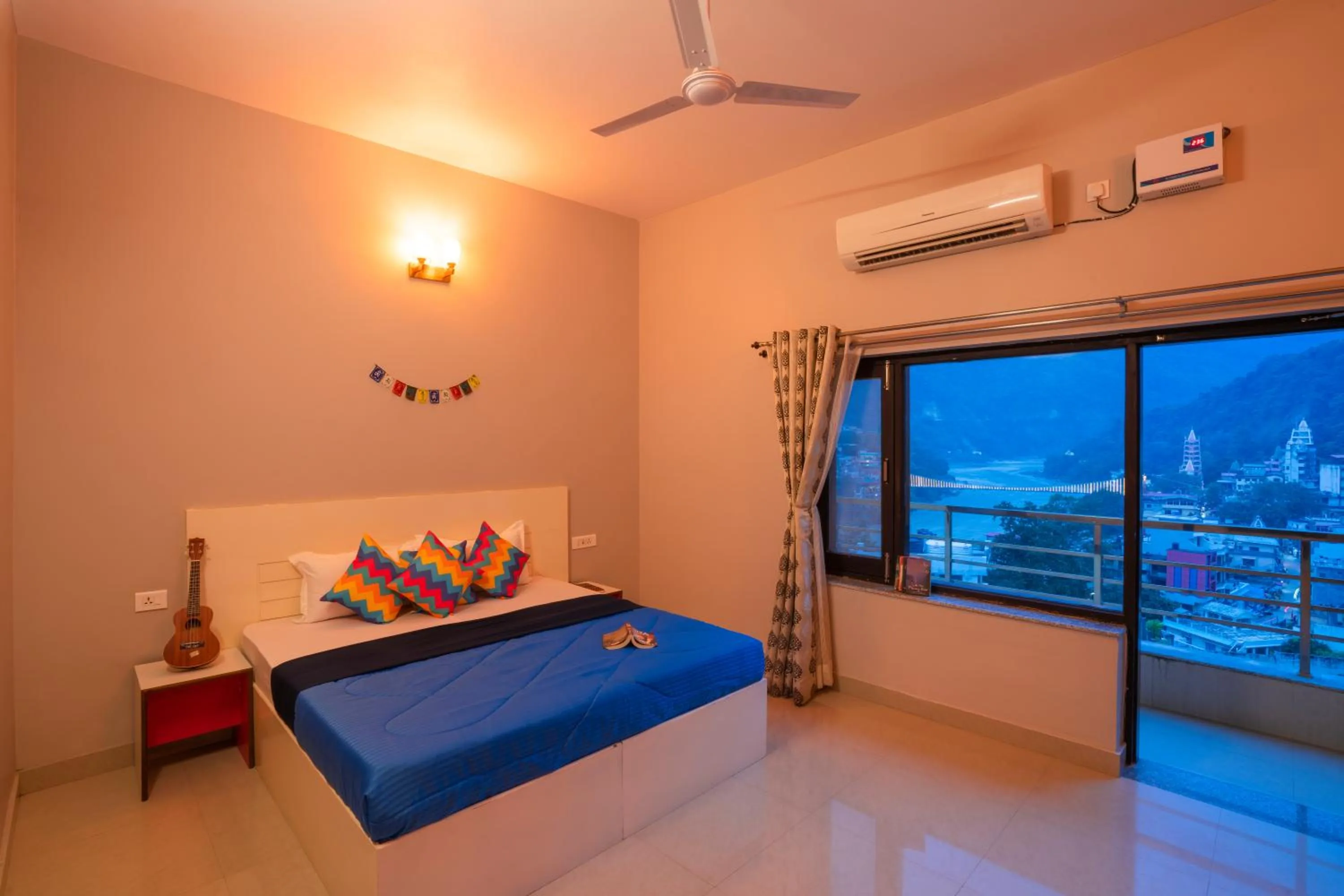 Deluxe Private A/C Room with Panoramic View and Ensuite Bathroom in goSTOPS Rishikesh, Lakshman Jhula