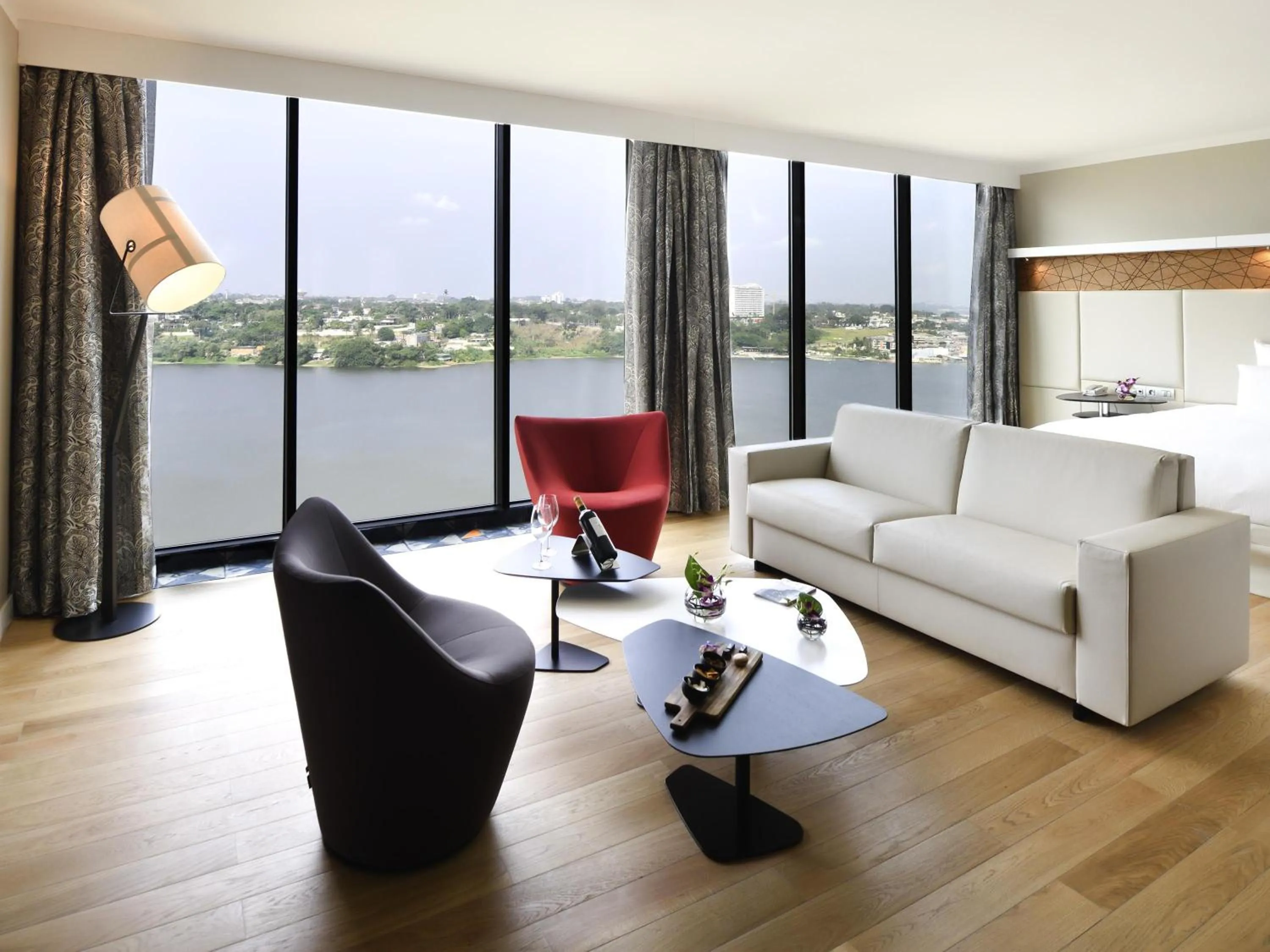Premium Junior King Suite with Lagoon View in Pullman Abidjan
