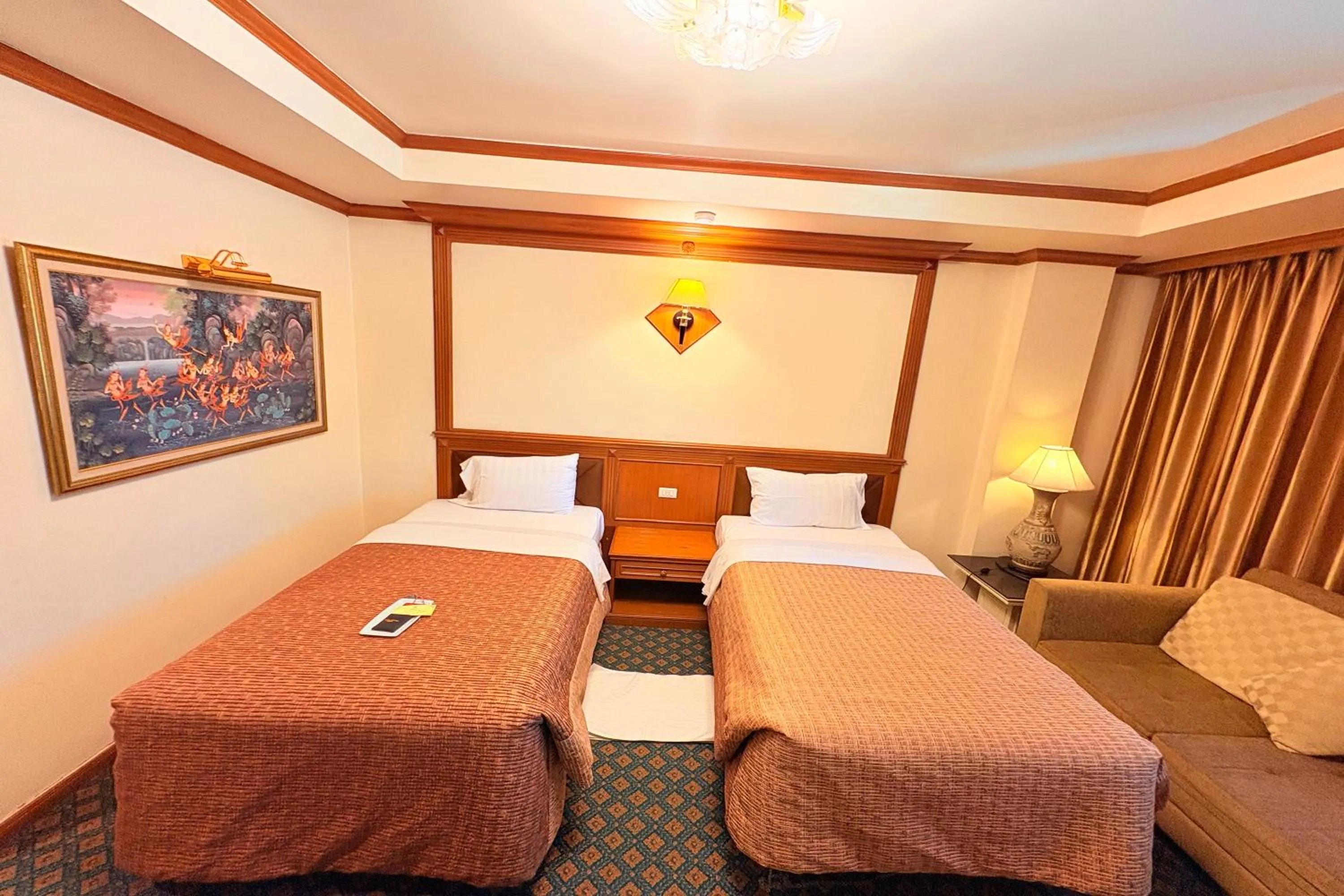 Twin Room in Taksila Hotel