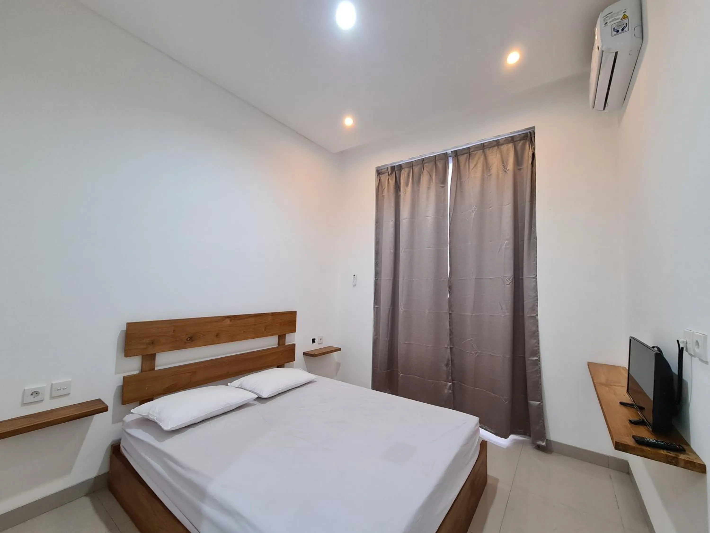 Standard Double Room in Graha Martadinata Syariah Mitra RedDoorz