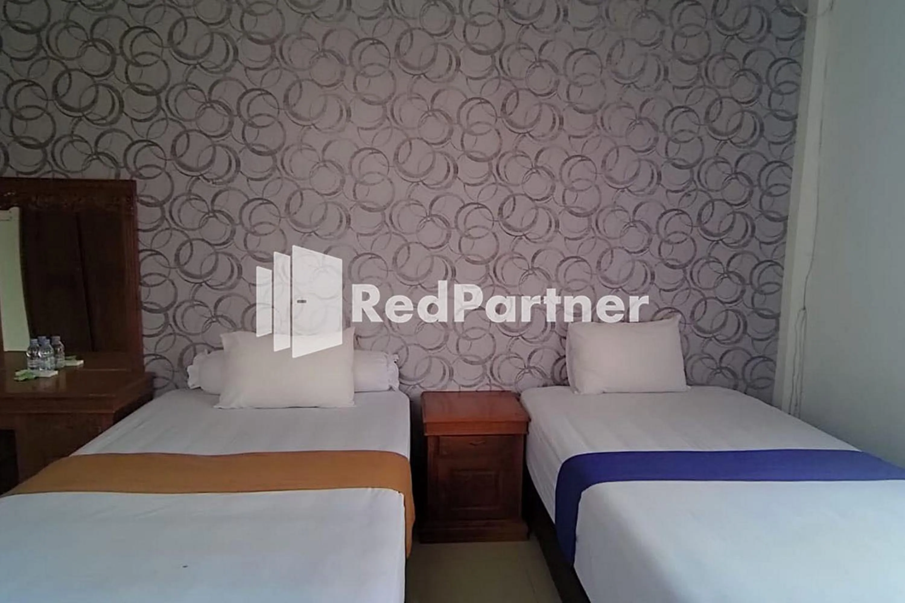 Twin Room in Hotel Abna Sangatta Mitra RedDoorz