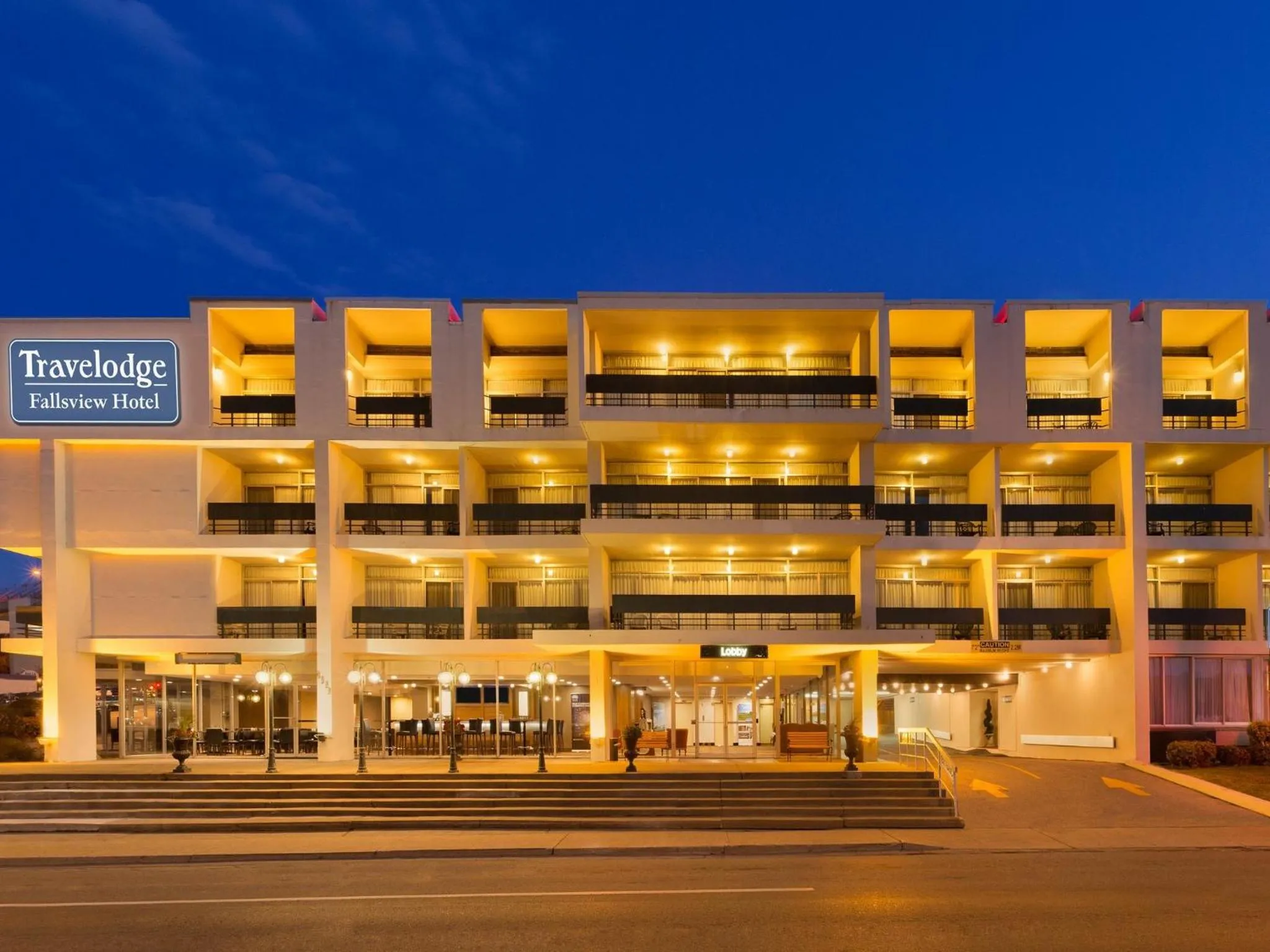 Queen Room with Balcony and River View in Travelodge by Wyndham Niagara Falls Fallsview