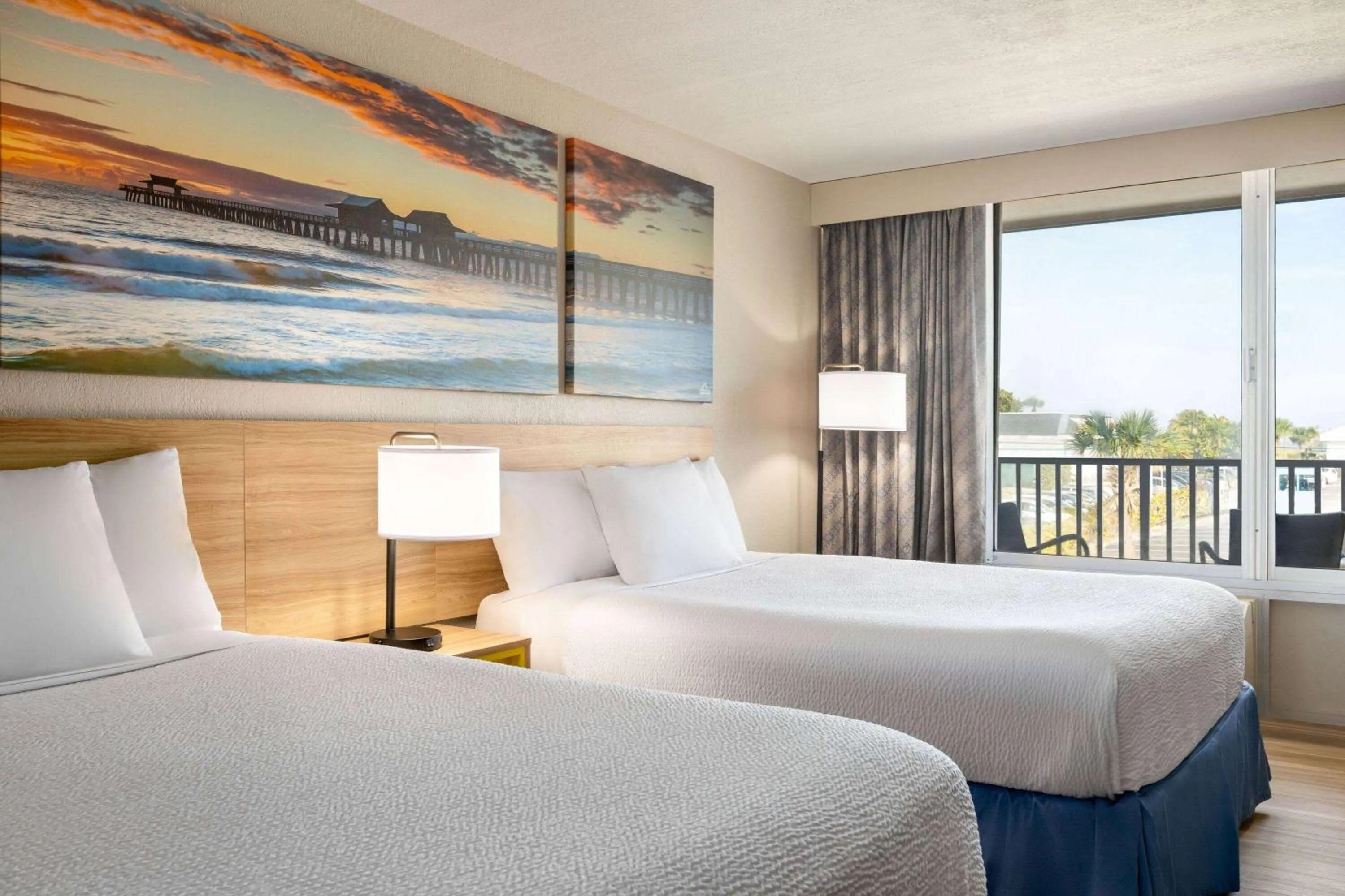 1 Bedroom Suite with 2 Queen Beds with Kitchen in Days Inn by Wyndham Cocoa Beach Port Canaveral