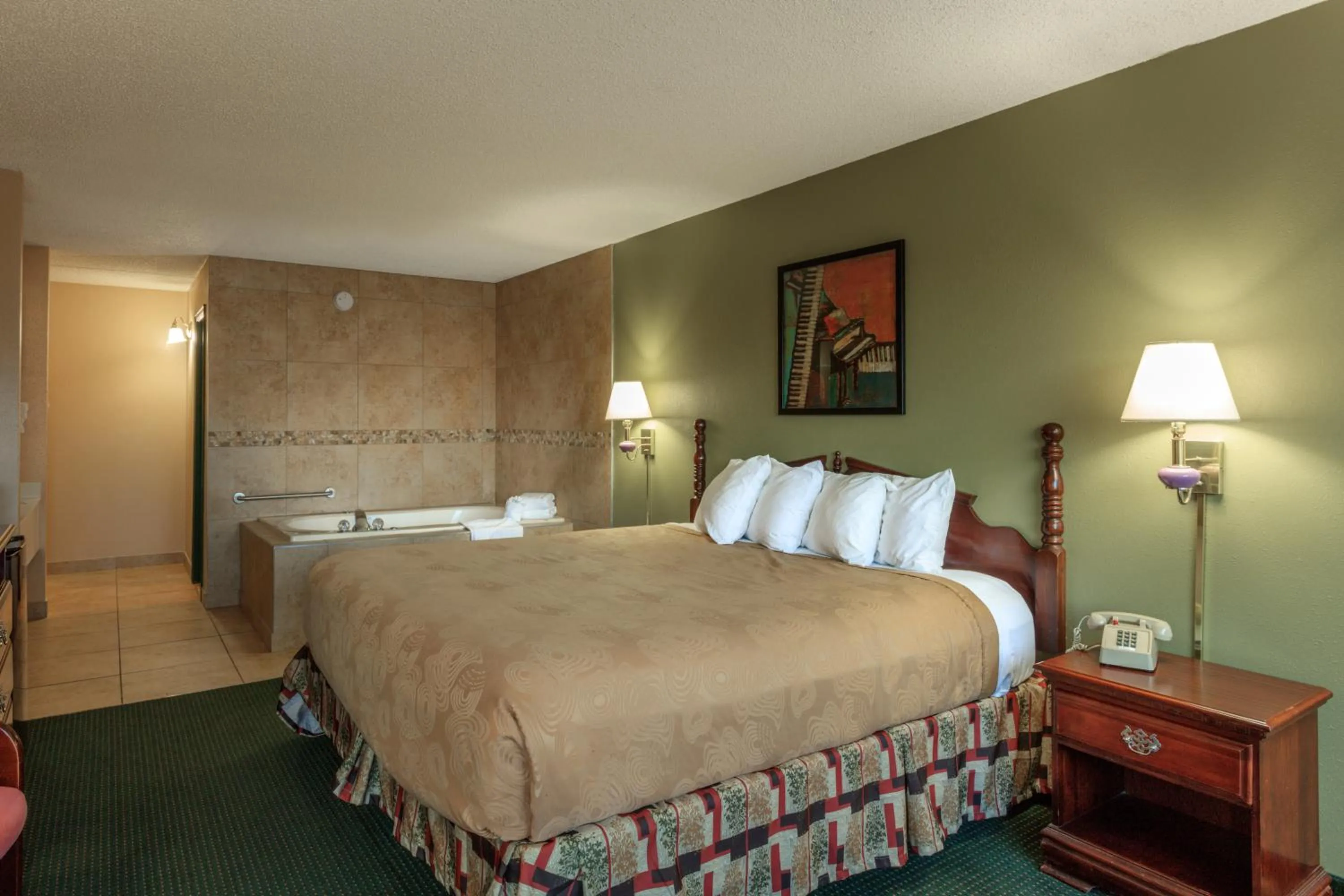King Room with Jacuzzi Select- Ground Level in Angel Inn Near IMAX, a Travelodge by Wyndham