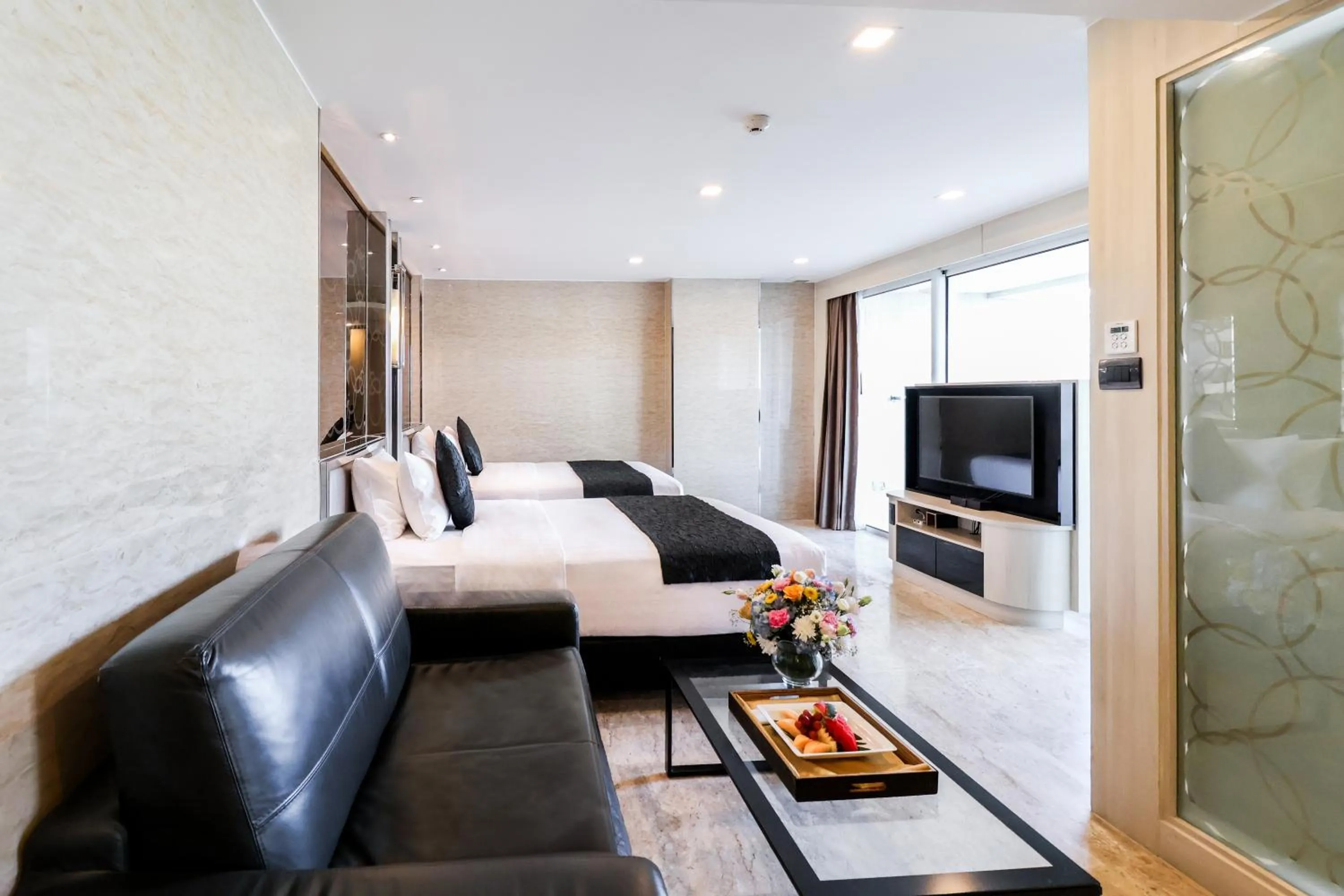 Junior Twin Suite with Balcony and City View - Non-Smoking in The Sanctuary Resort Pattaya, BW Signature Collection