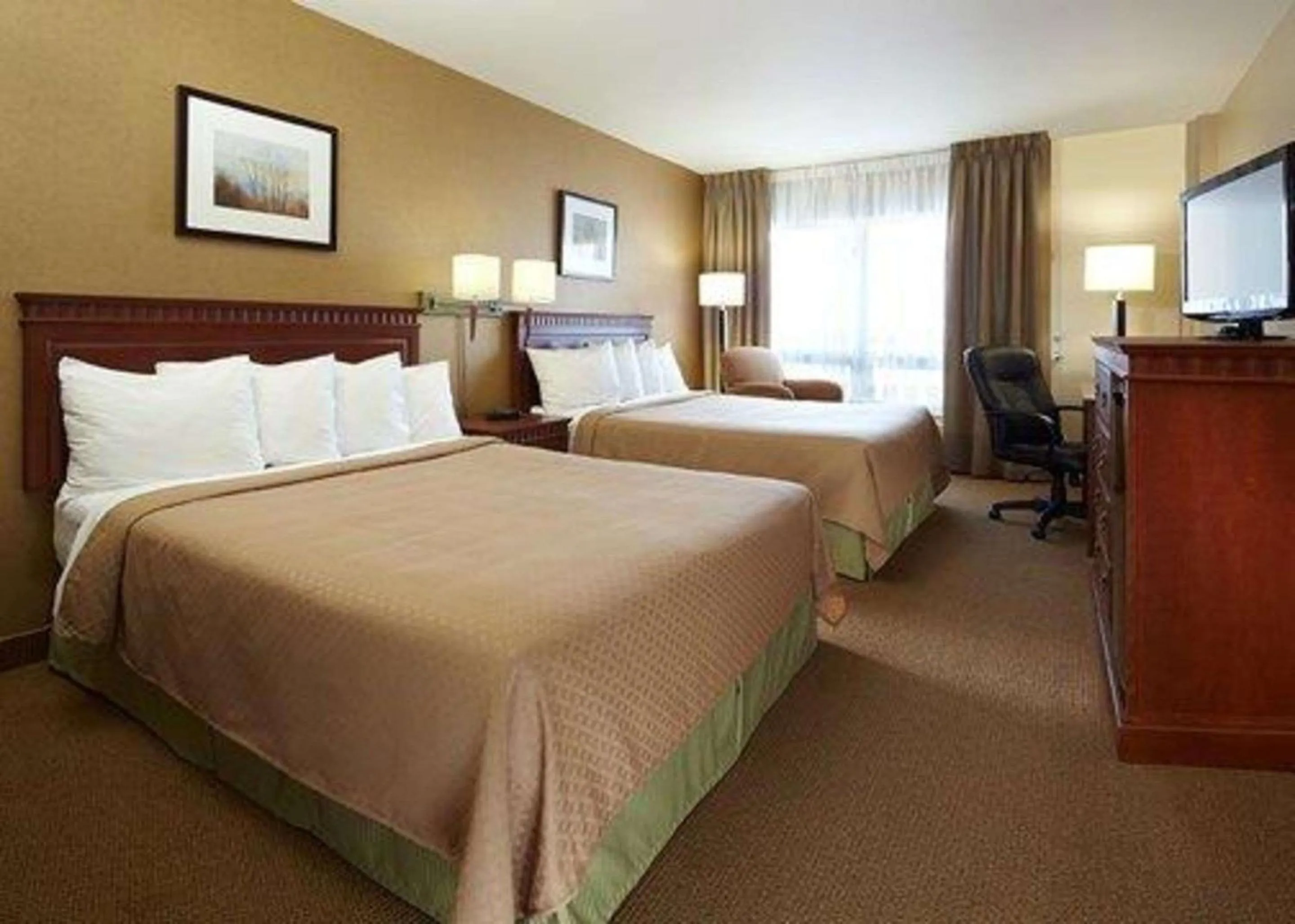 Queen Room with Two Queen Beds - Non-Smoking in Quality Inn & Suites PE Trudeau Airport