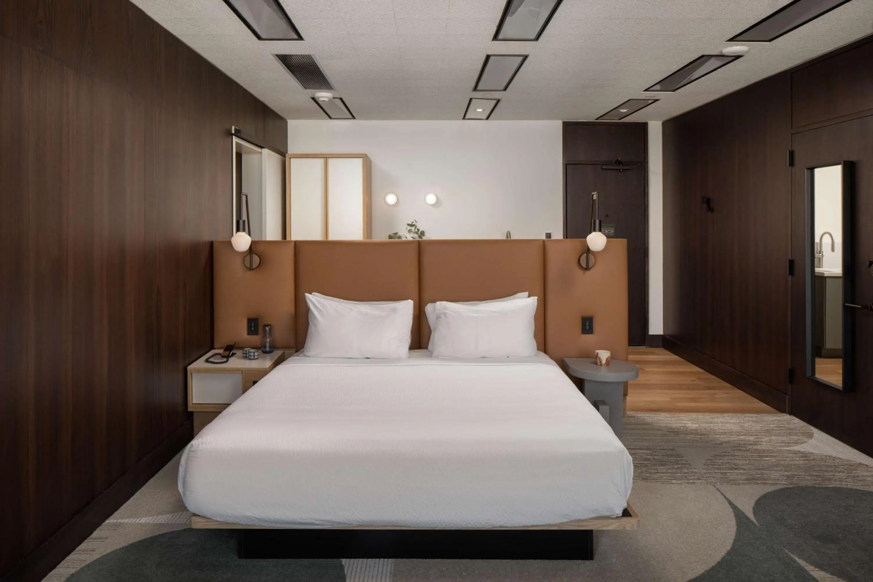 King Suite with Sofa Bed and Water View in Hotel Marcel New Haven, Tapestry Collection By Hilton