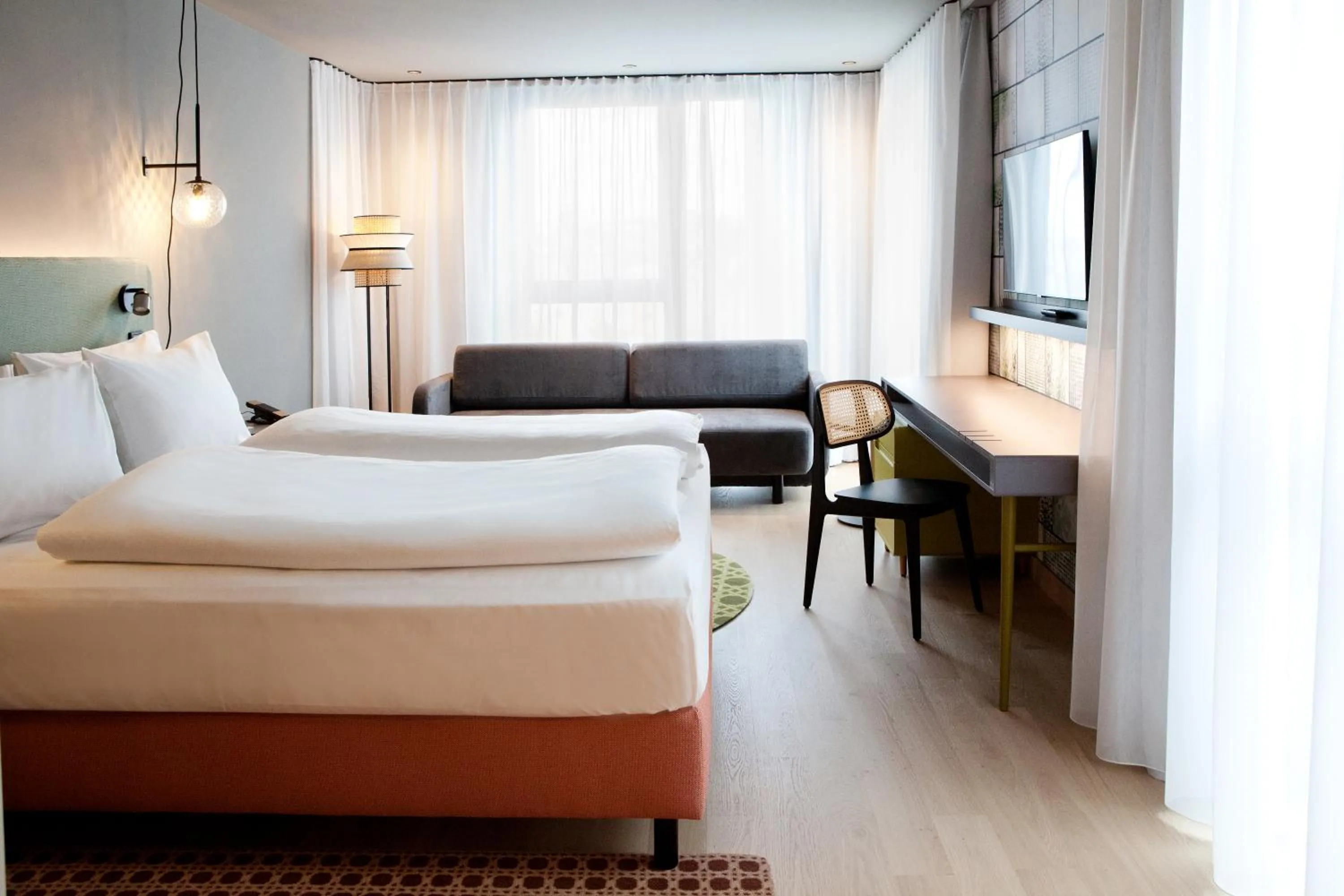 Premium Queen Room with Sofa Bed and Garden View in Hotel Indigo Vienna - Naschmarkt by IHG