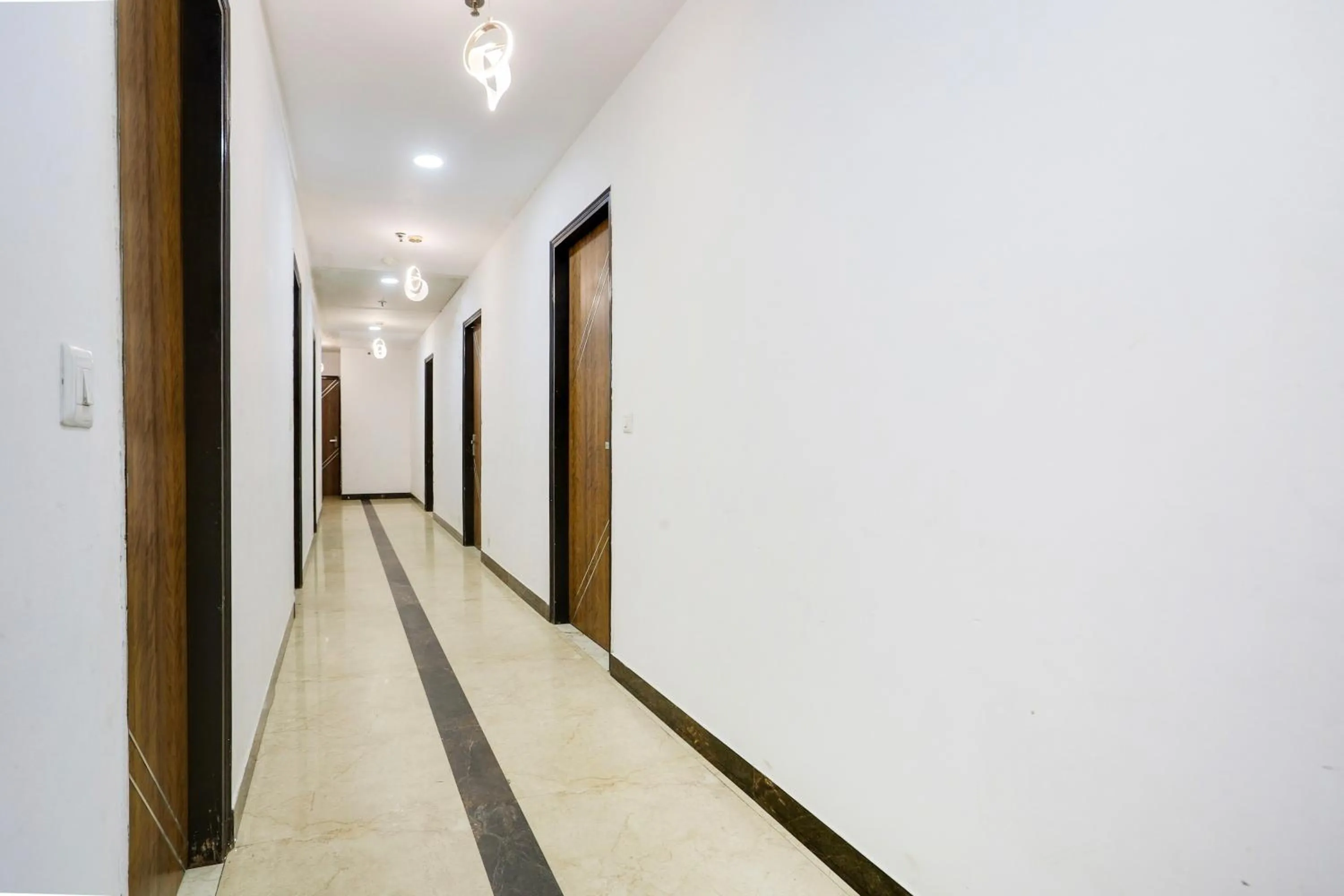 Classic Triple Room - single occupancy in Collection O Golden Key Near TDI Mall