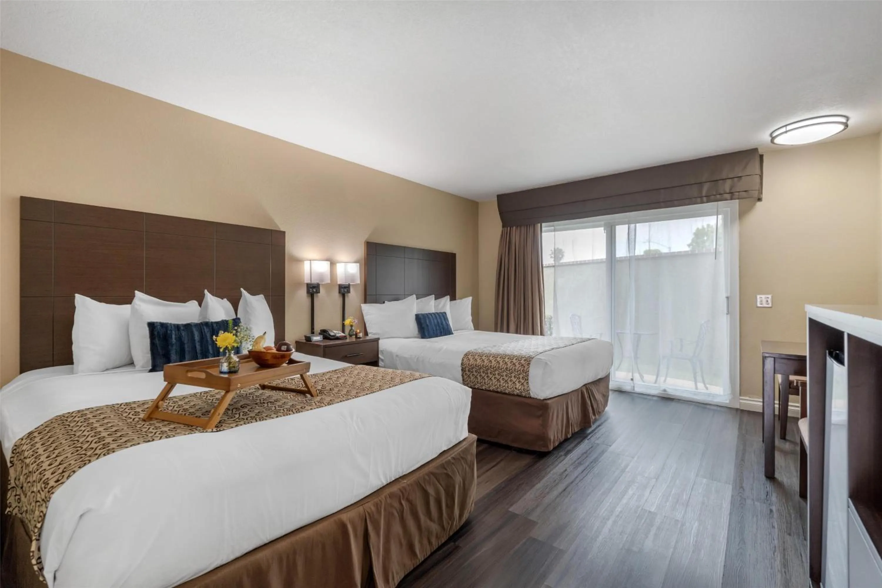 Queen Room with Two Queen Beds and Patio - Non-Smoking in Best Western Westminster Inn