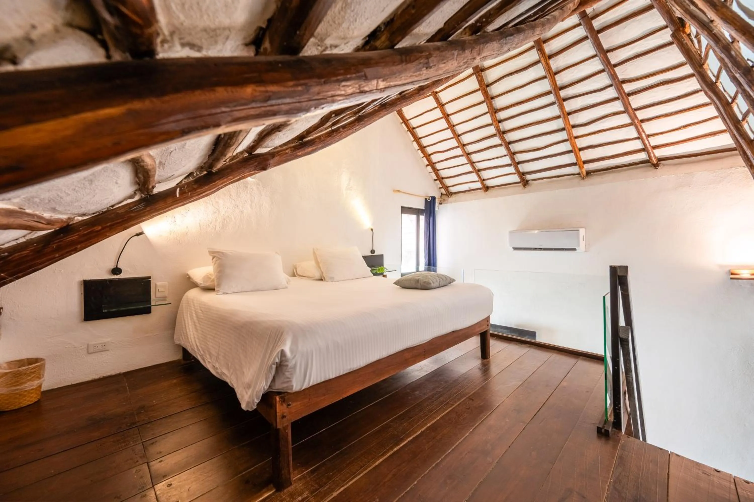 loft with king size bed and sofa bed in Kinbe Hotel Boutique